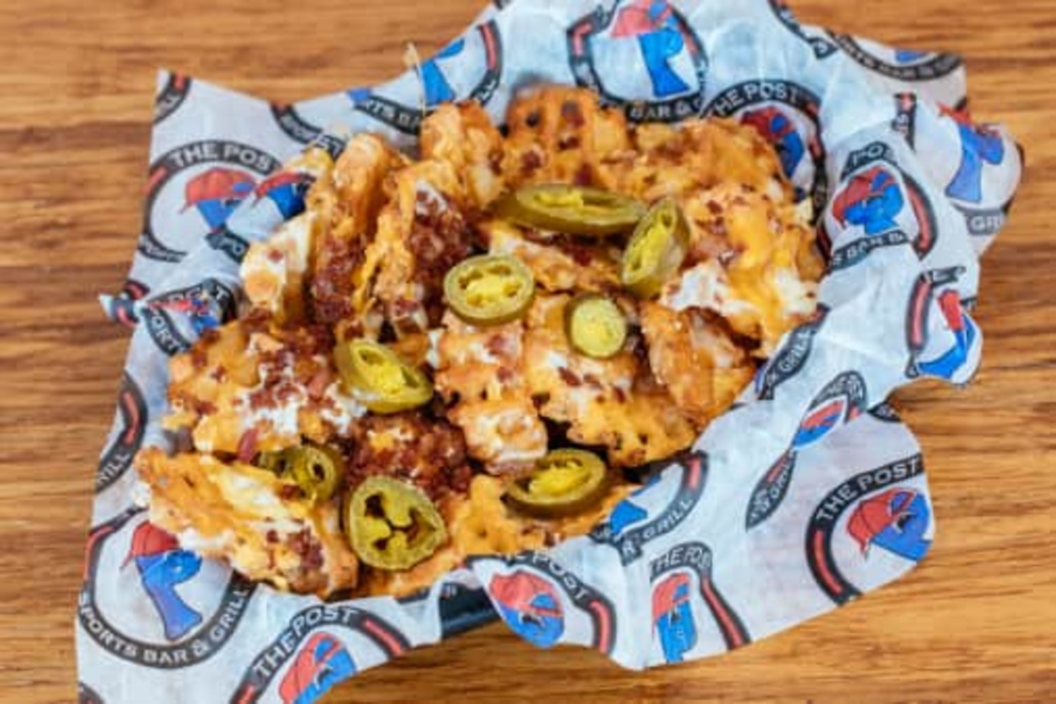 Order Side of Loaded Waffle Fries food online from The Post Sports Bar & Grill store, Creve Coeur on bringmethat.com