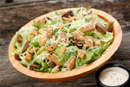 Order Caesar Salad food online from Extreme Pizza store, Arlington on bringmethat.com