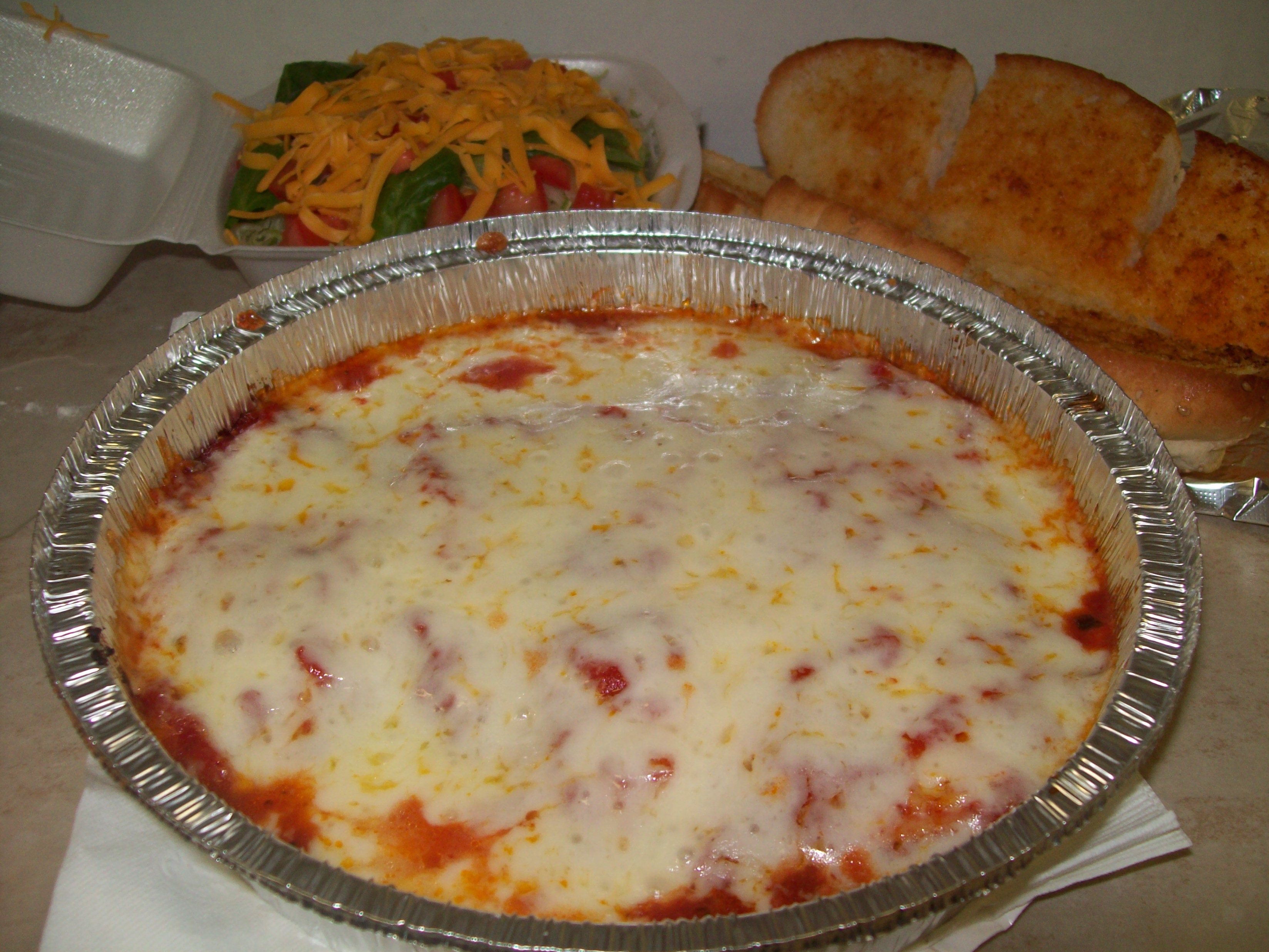 Order Lasagna food online from Rinaldi Pizza & Sub Shop store, Marne on bringmethat.com