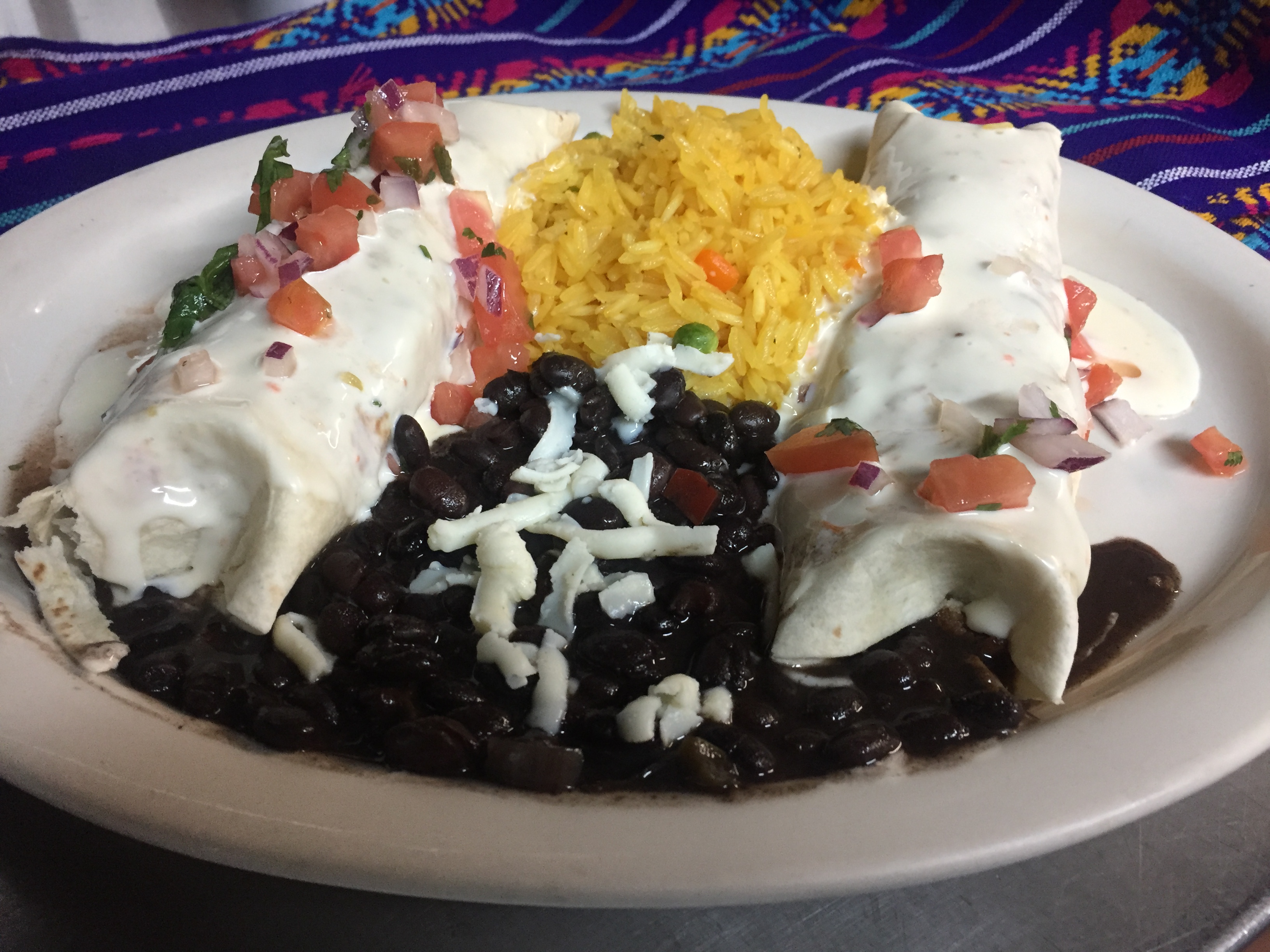 Order Steak Burritos Topped with Nacho Cheese food online from El Patron Mexican Grill & Cantina store, Albany on bringmethat.com