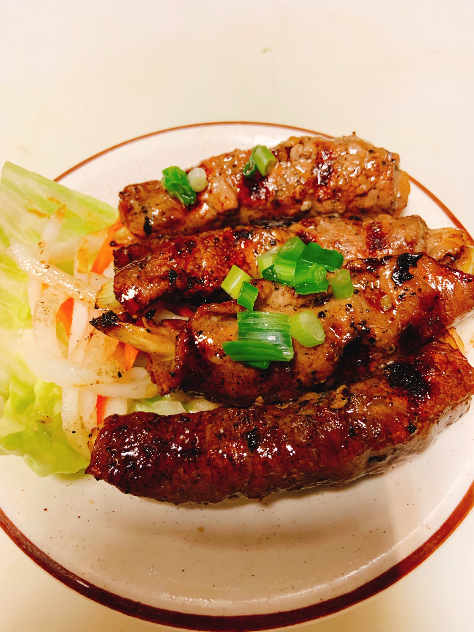 Order 11. Bo Nuong Hanh/Grilled onion beef food online from Pho Bistro store, Malden on bringmethat.com