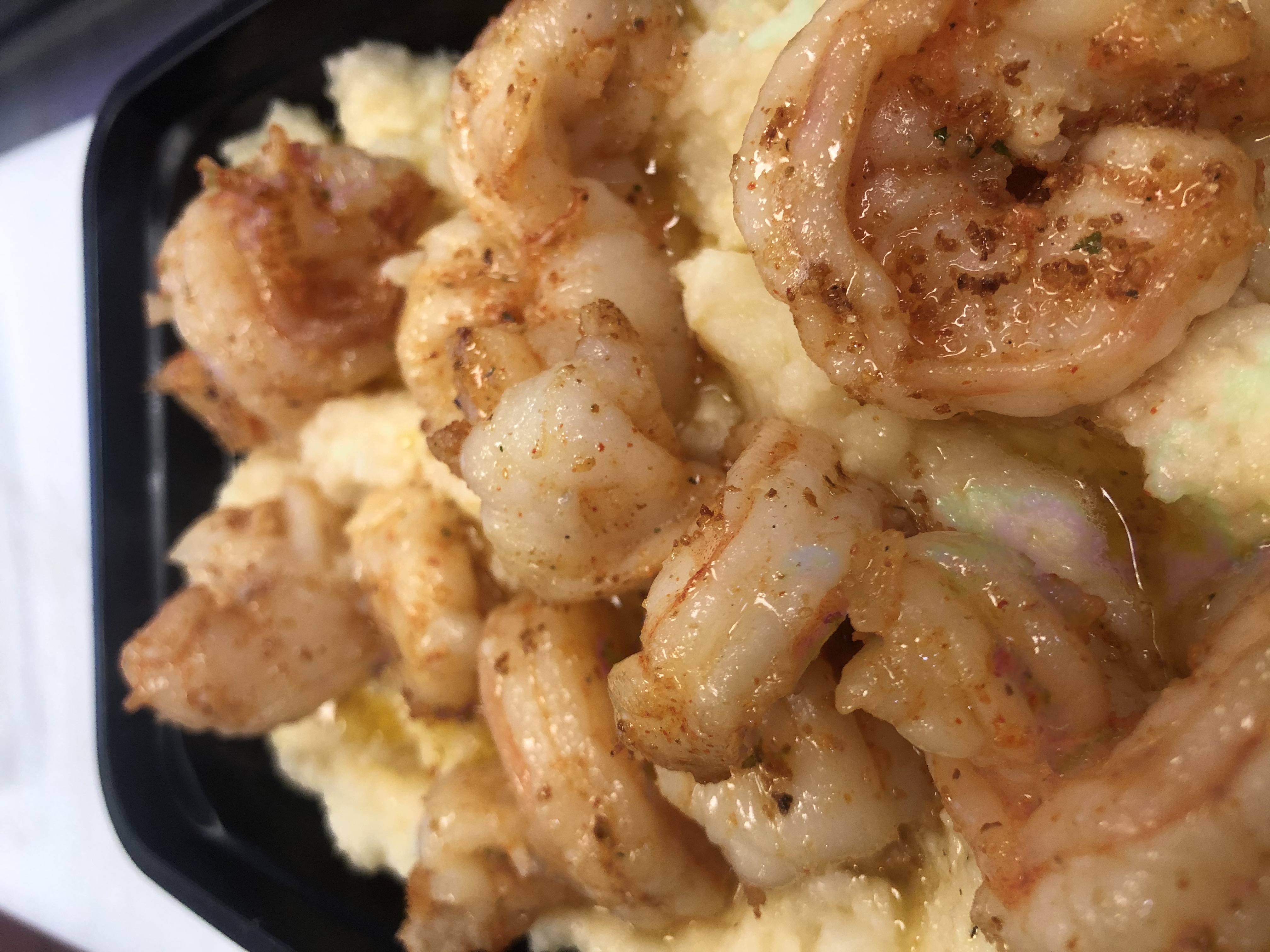 Order Shrimp and grits food online from Cajun Country Cafe store, Oxnard on bringmethat.com