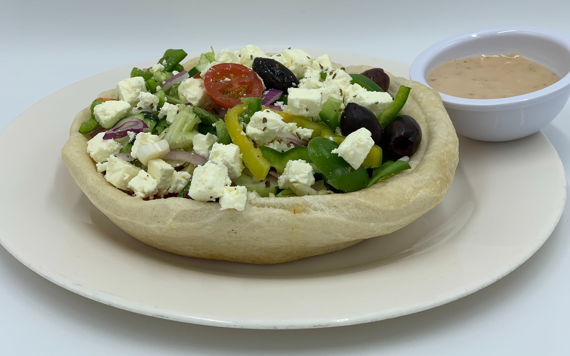 Order Greek Salad Bread Bowl with Chicken - Salad food online from Mario Pizza store, Westbury on bringmethat.com