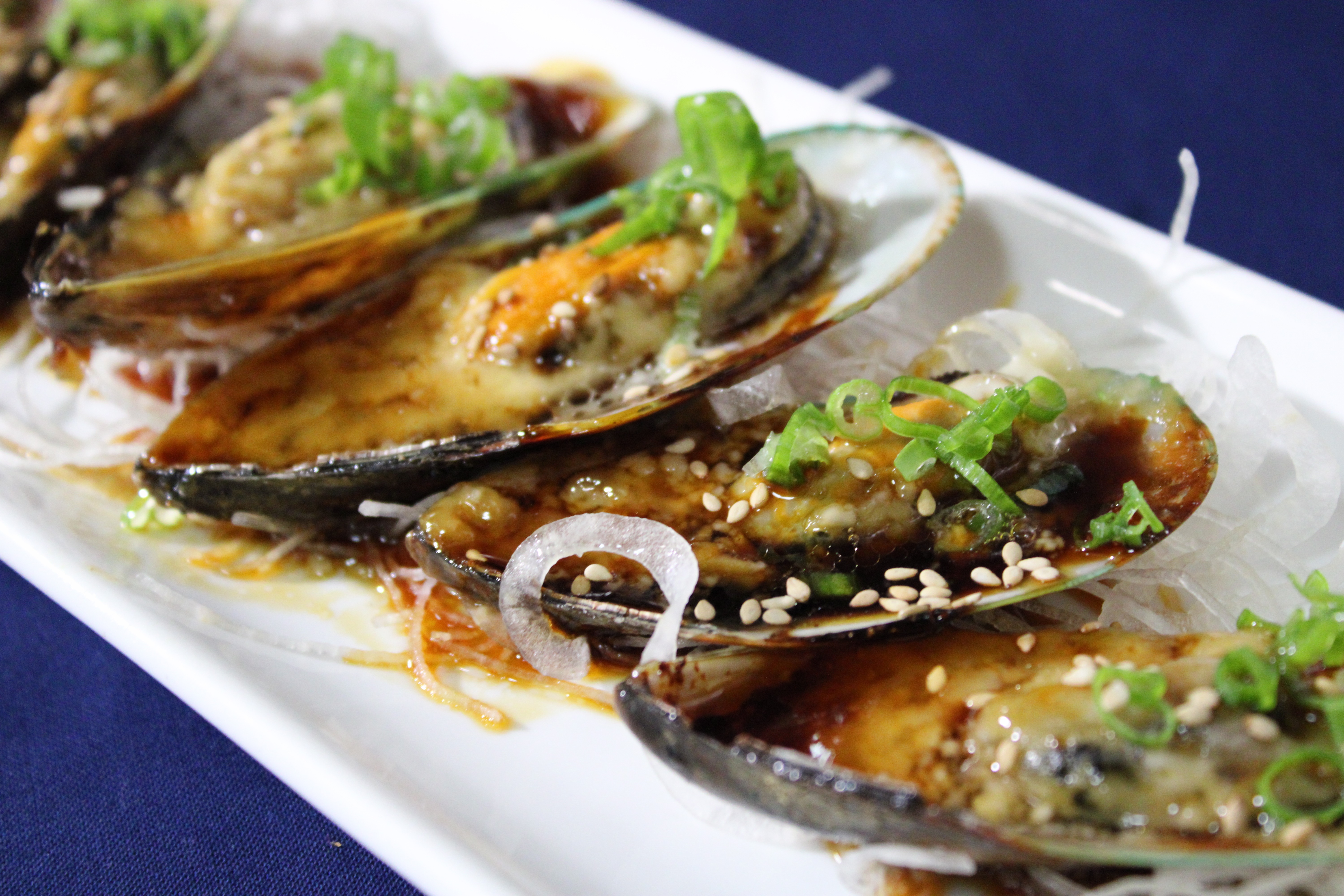 Order Baked Green Mussel food online from Kibo Sushi store, Ventura on bringmethat.com