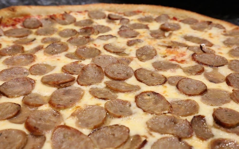Order Sausage Pizza - Pizza food online from Little Italy Pizza store, New York on bringmethat.com