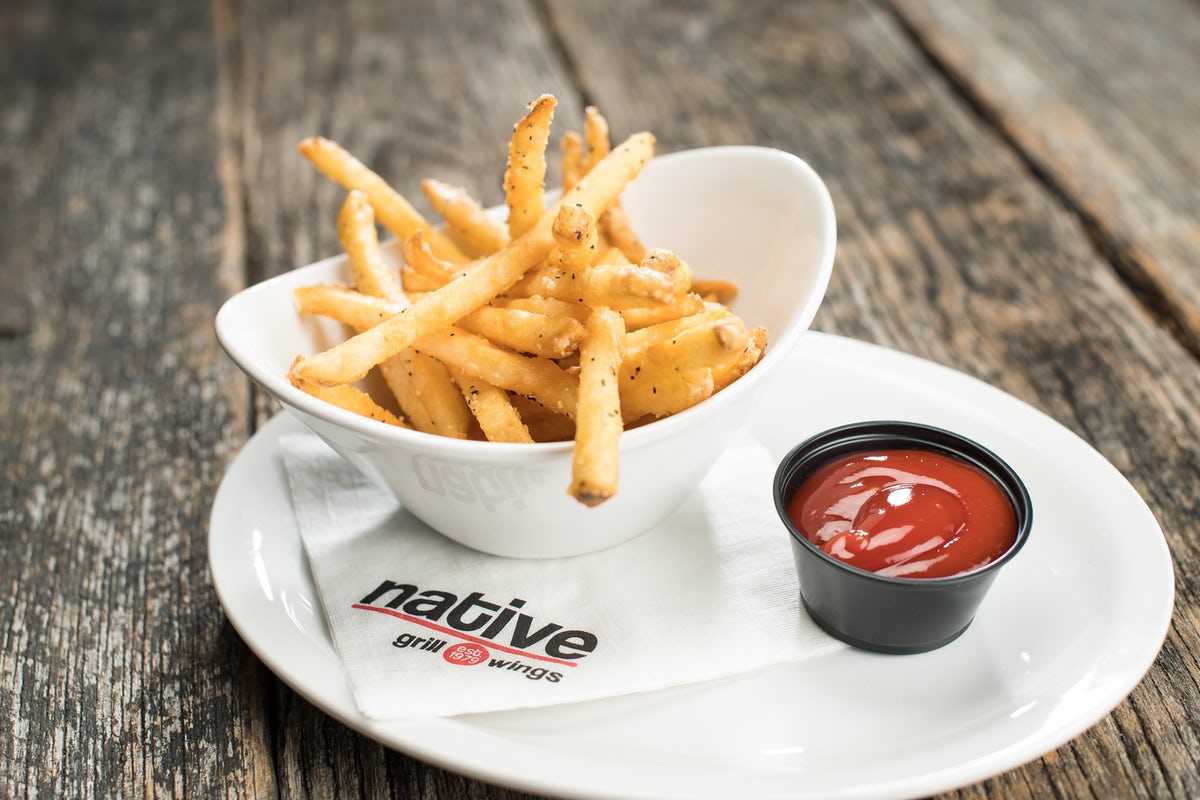 Order French Fries food online from Native Grill & Wings store, Surprise on bringmethat.com