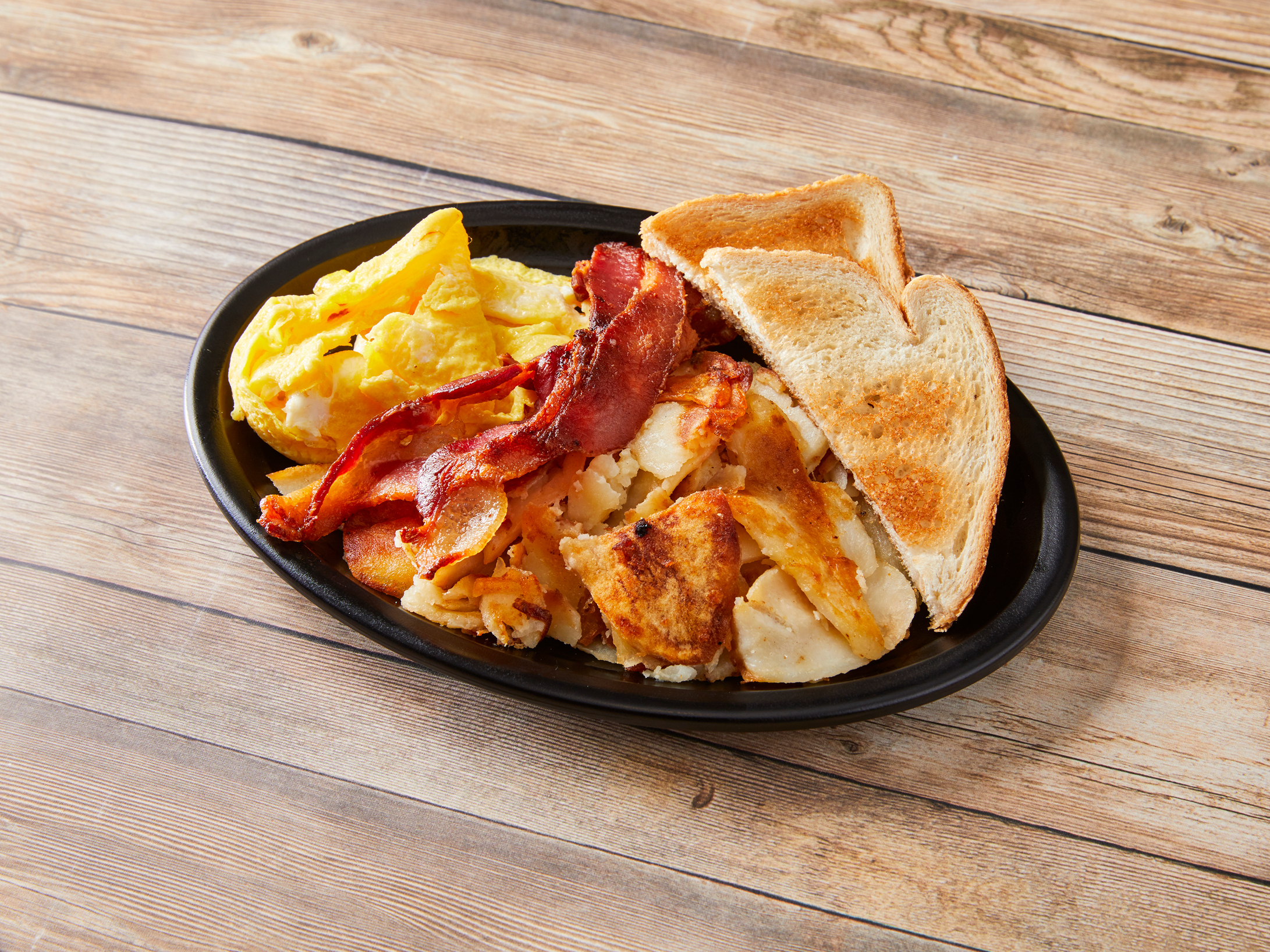 Order 2 Eggs with Bacon food online from Yellow Cat Cafe store, South Bend on bringmethat.com