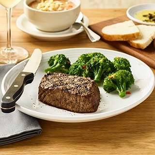 Order Tuscan-Grilled Sirloin* 7oz food online from Carrabba's store, Winston Salem on bringmethat.com