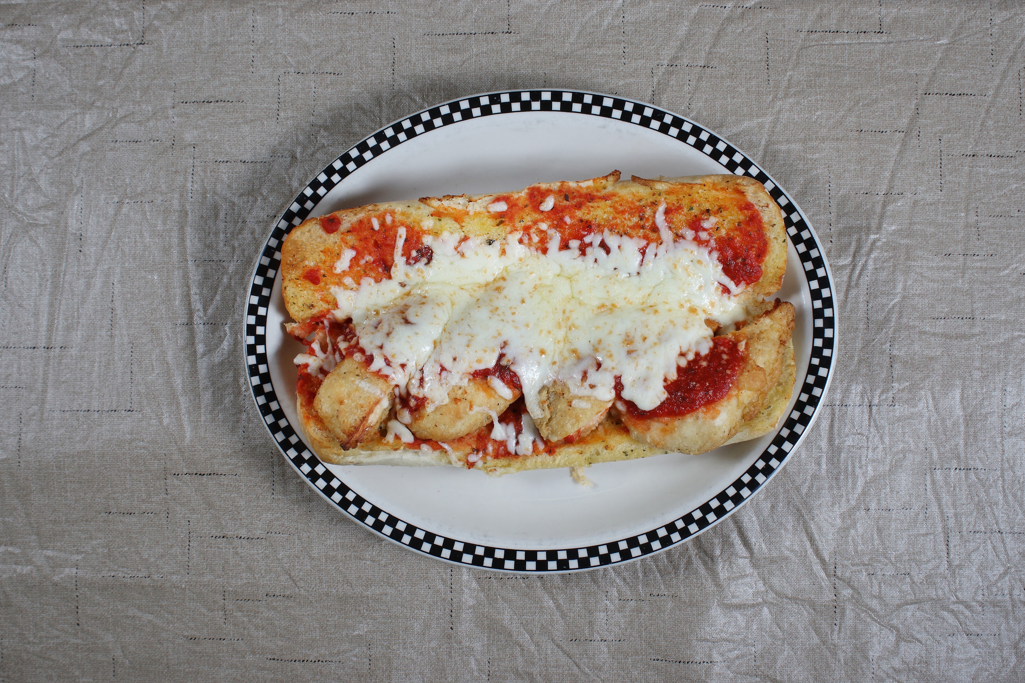 Order Chicken Parm Sub food online from Village Pizza store, Tega Cay on bringmethat.com