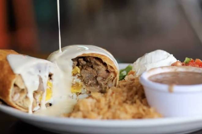 Order Steak & Egg Chimichanga food online from Ceviche store, Roswell on bringmethat.com