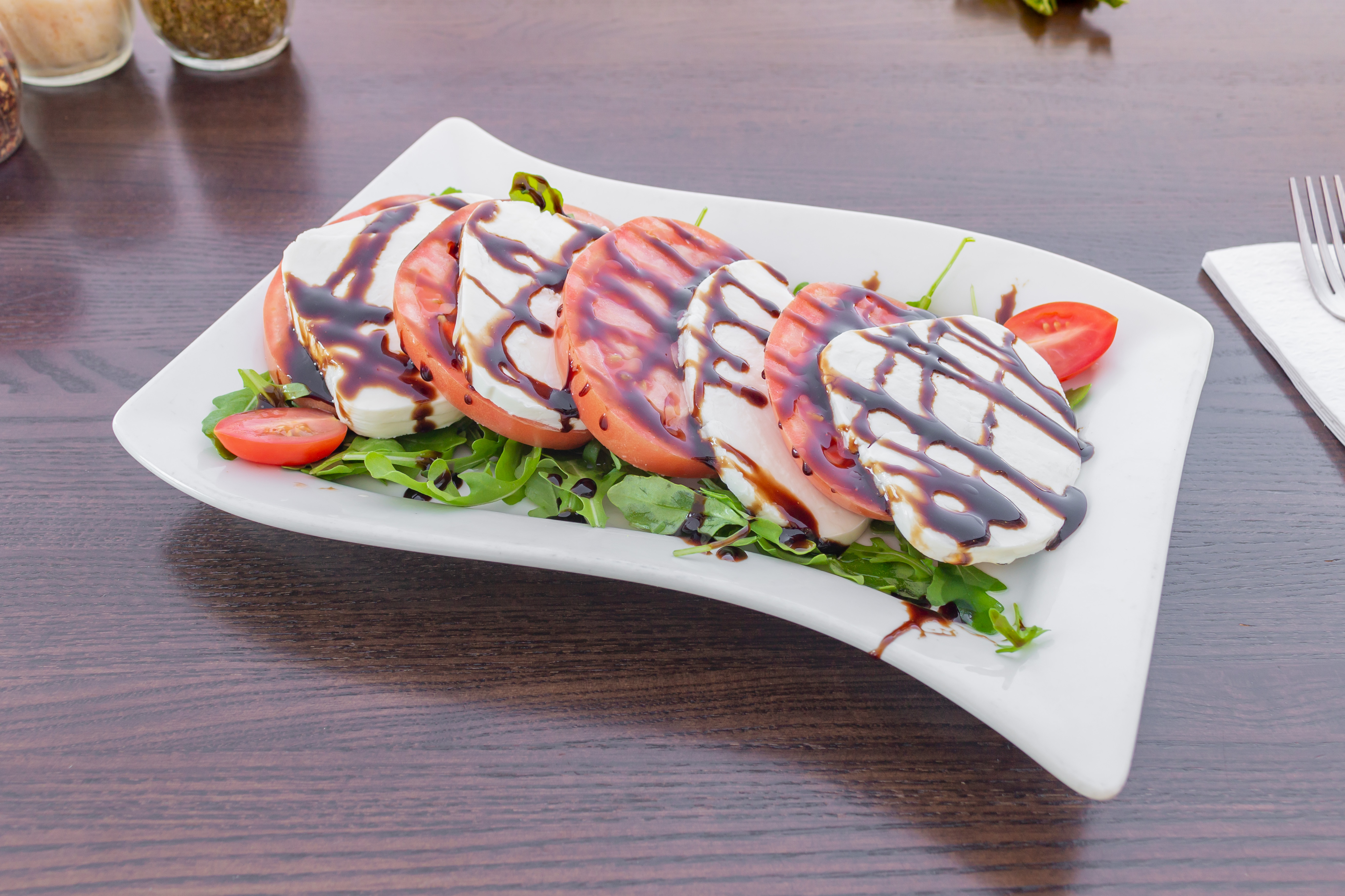 Order Caprese Appetizer food online from Nino's Pizza & Restaurant store, Hillsdale on bringmethat.com