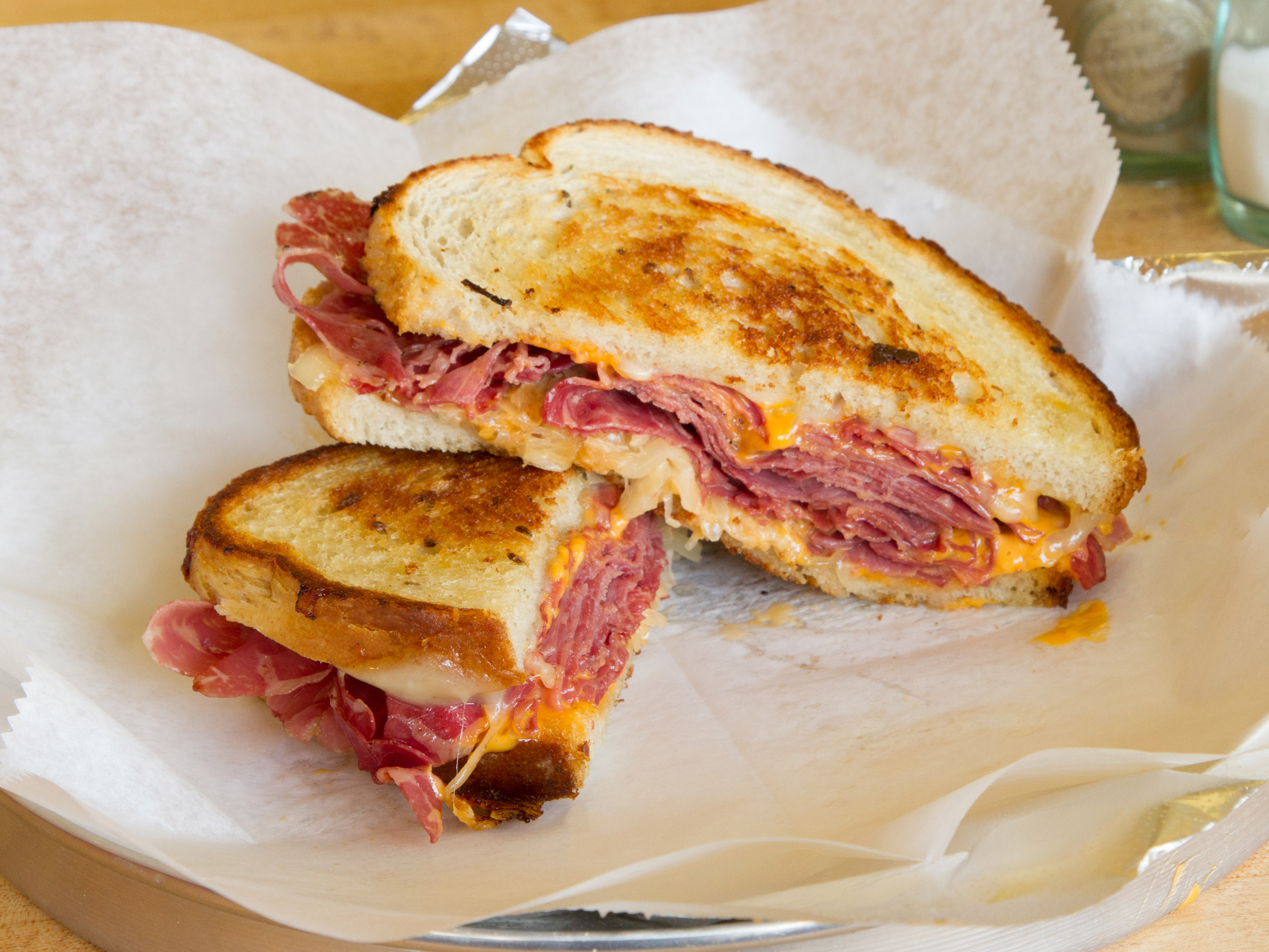 Order The Reuben Sandwich food online from The Real Deal Deli store, West Roxbury on bringmethat.com