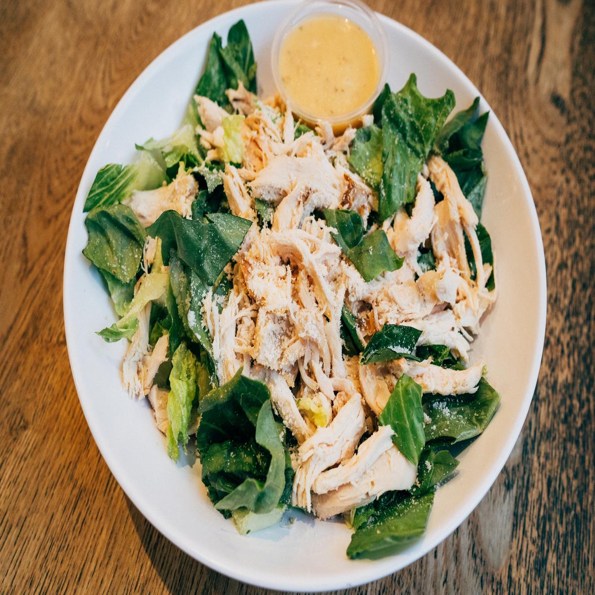 Order Chicken Caeasar salad food online from Poulette rotisserie chicken store, New York on bringmethat.com