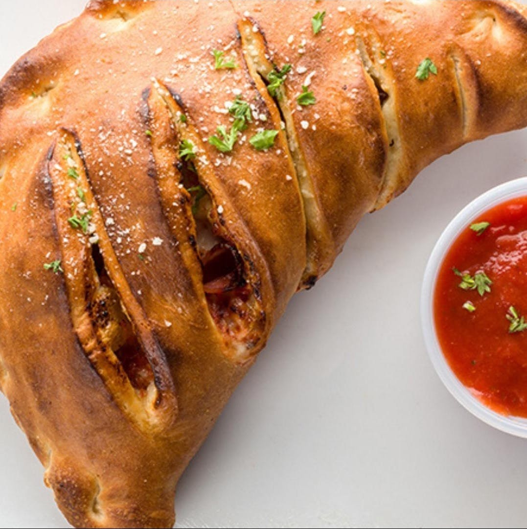Order Calzone - Calzone food online from Pepperoni's Pizza store, Rosenberg on bringmethat.com