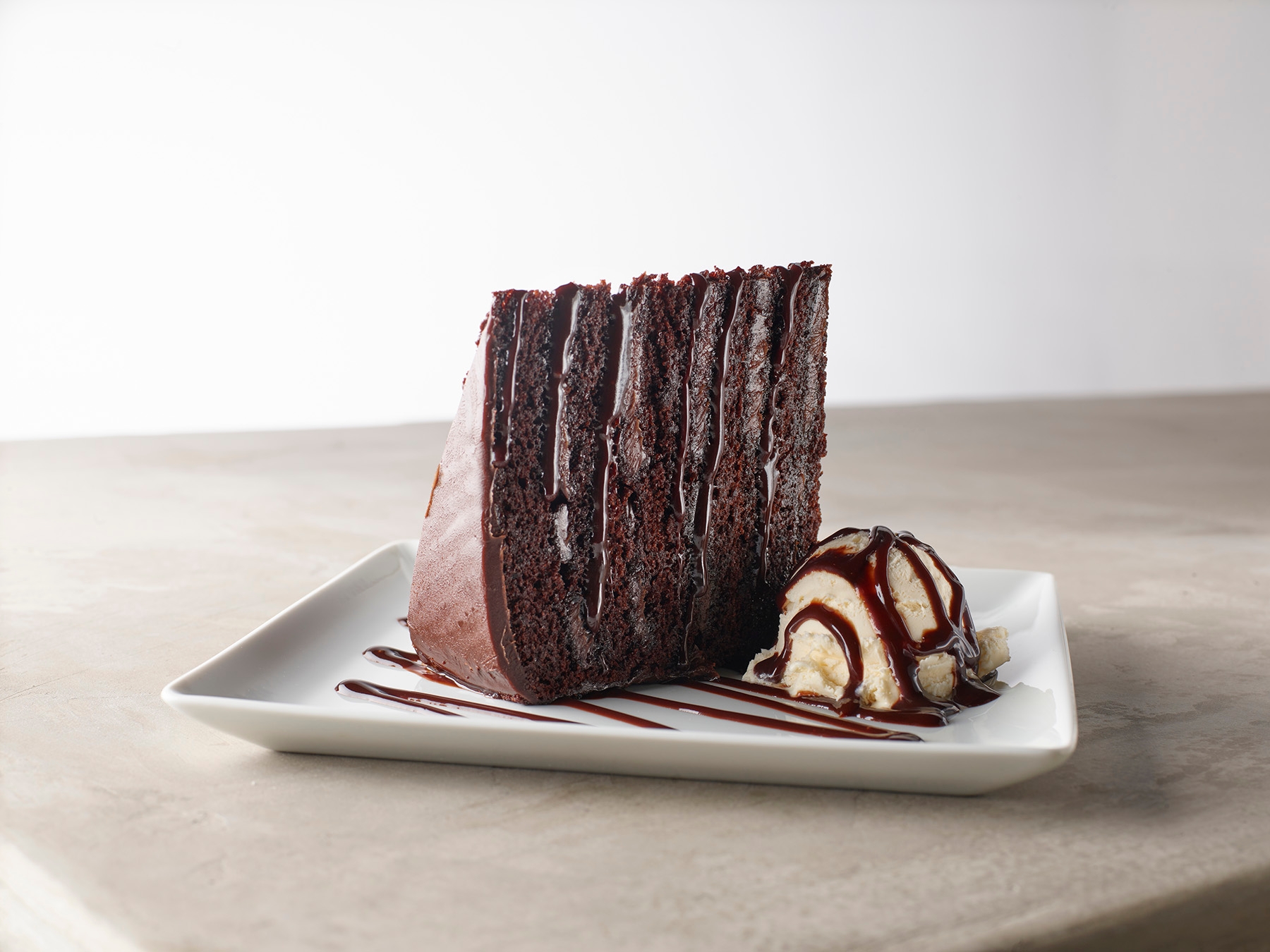 Order Layered Chocolate Cake food online from Smokey Bones (#76340 store, Tarentum on bringmethat.com