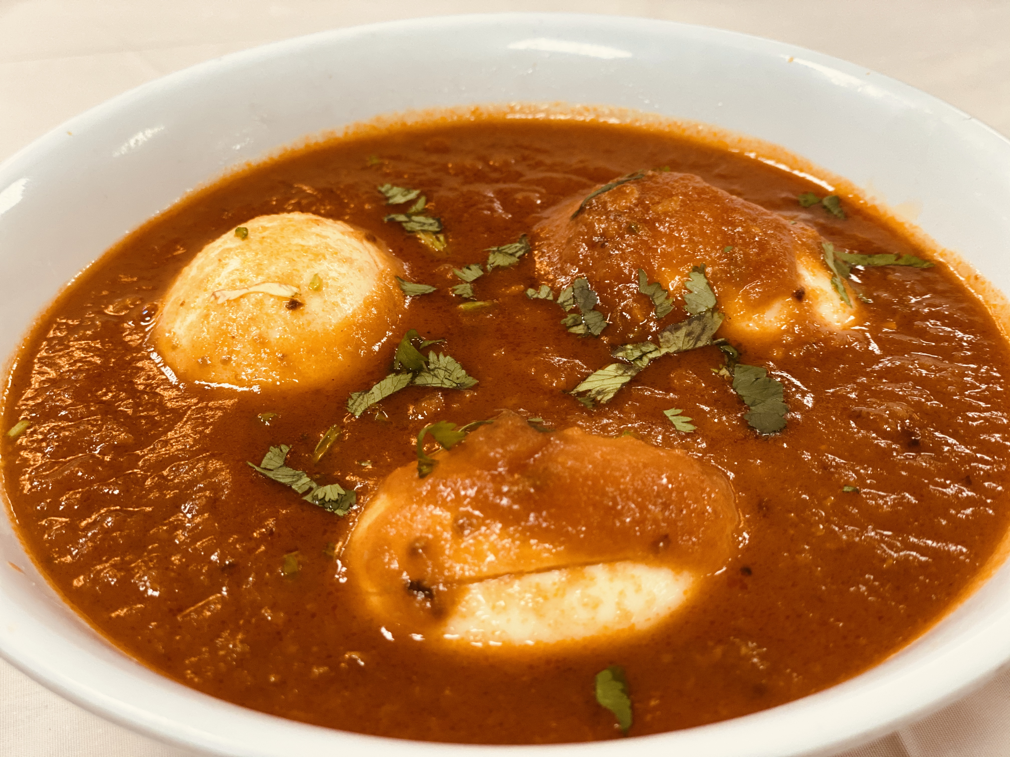 Order Egg Curry food online from Bombay Blues Indian Restaurant store, Chino Hills on bringmethat.com