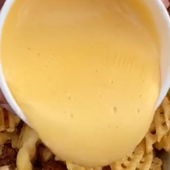 Order QUESO CHEESE food online from Howdy Hot Chicken store, Houston on bringmethat.com