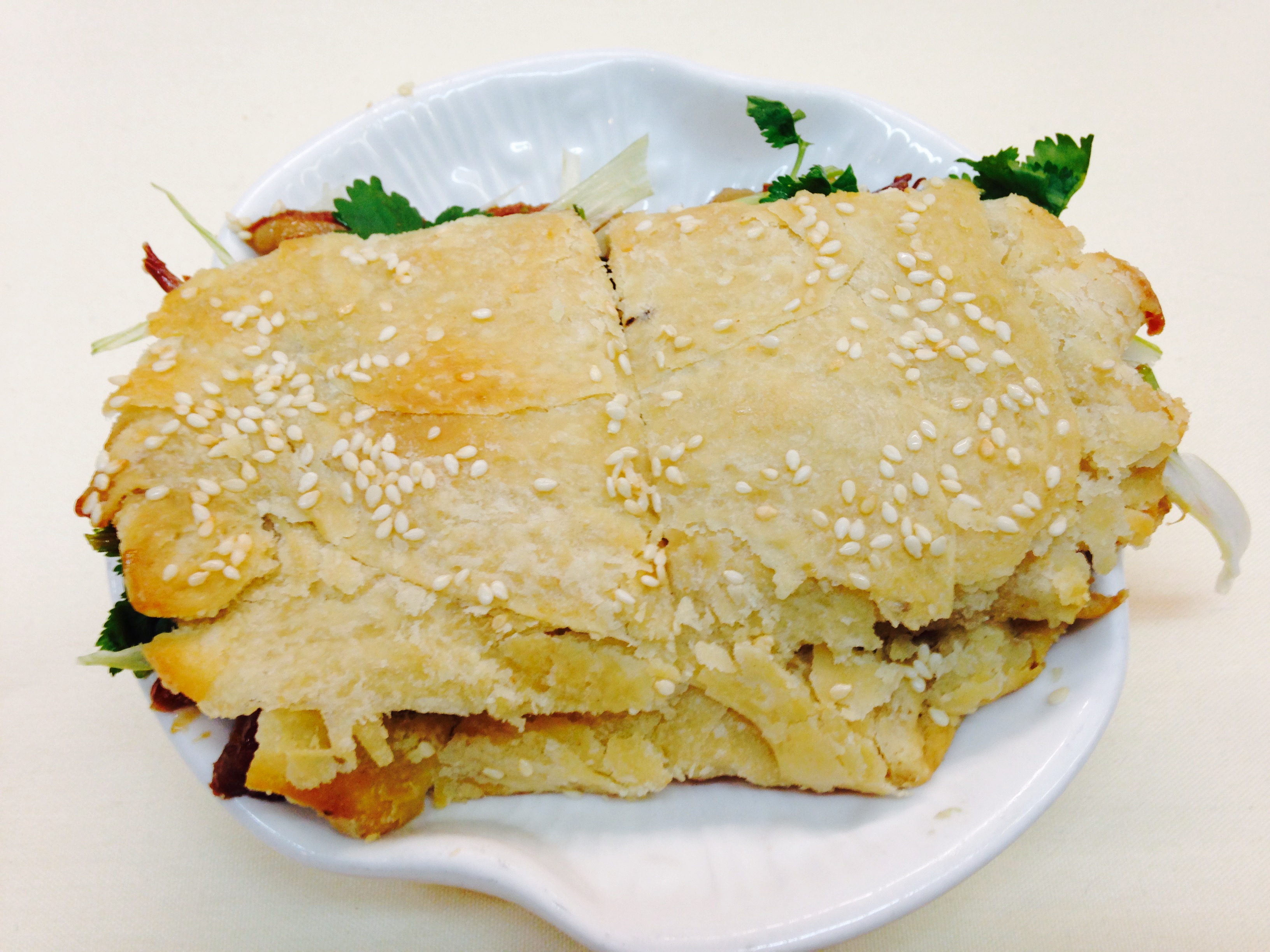 Order baked wheat cake stuffed with pork food online from Joy Restaurant store, San Mateo on bringmethat.com