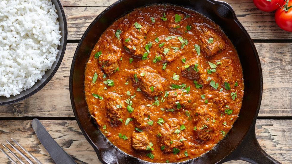 Order Andhra Chicken Curry food online from Fire Biryani store, Plano on bringmethat.com