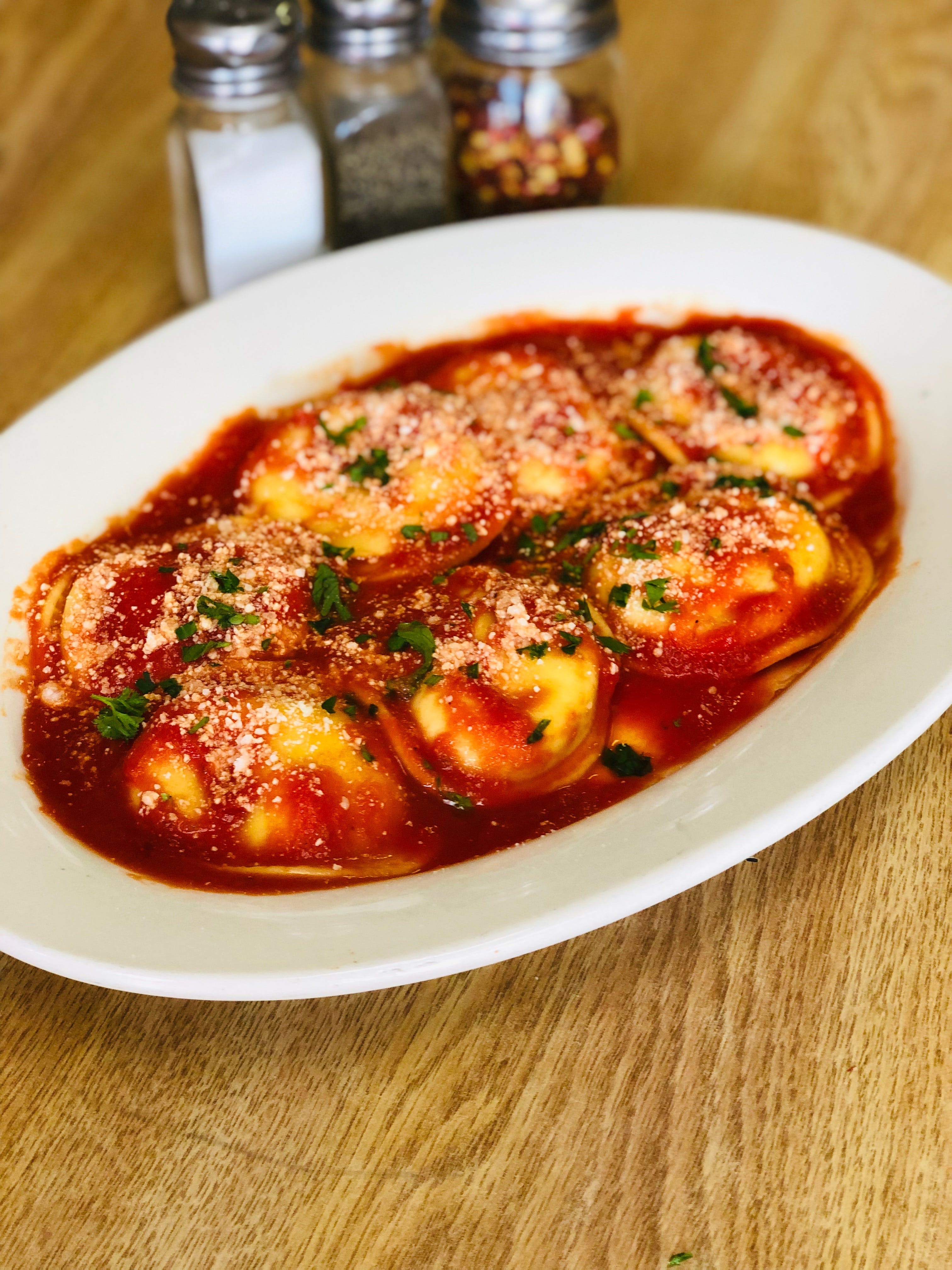 Order Cheese Ravioli with Tomato Sauce - Pasta food online from Nonna Rosa Pizzeria store, Bridgeport on bringmethat.com