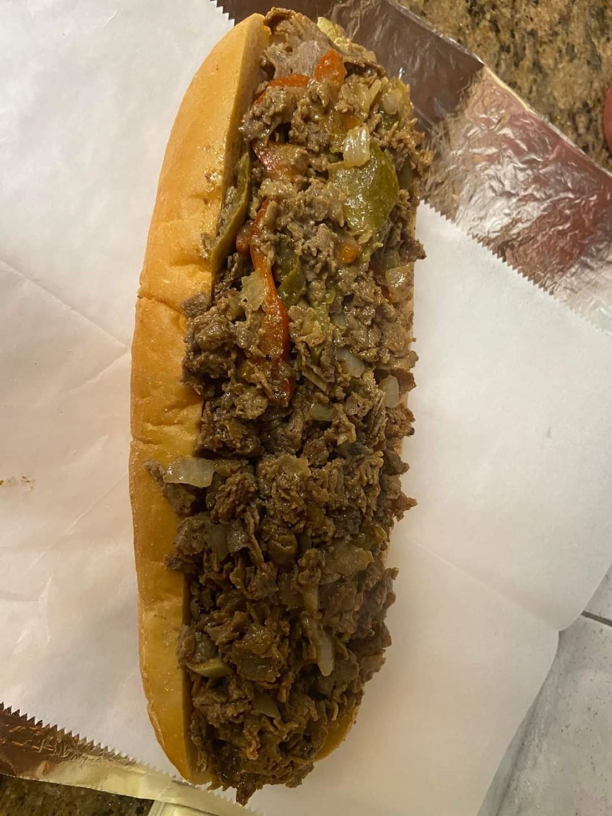Order Small 10" Philly Cheesesteak Sandwich food online from Italian Kitchen store, Pennsville on bringmethat.com