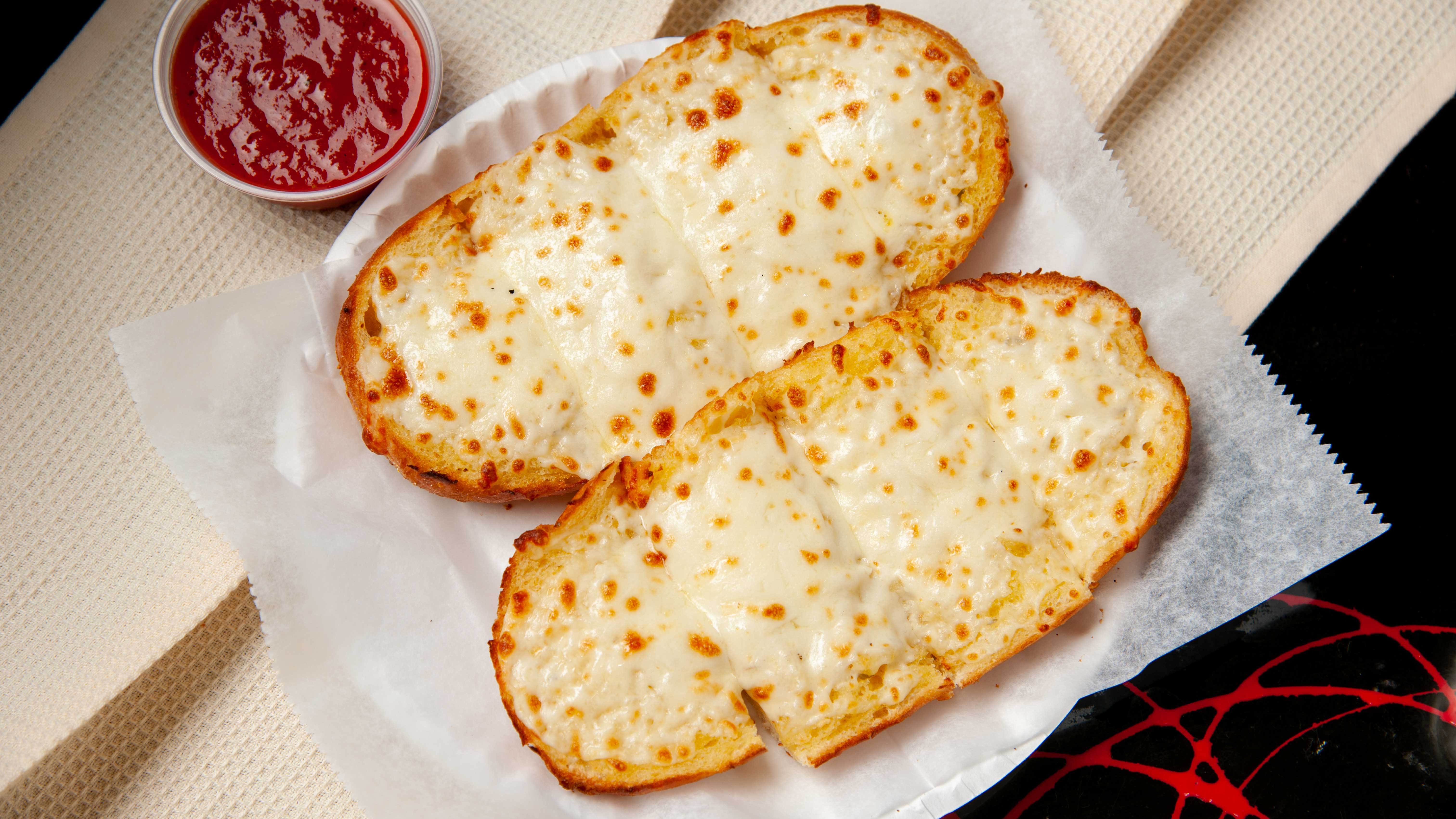 Order Cheesy Garlic Bread food online from Halwani Cuisine, Pizza & Stromboli store, Columbus on bringmethat.com