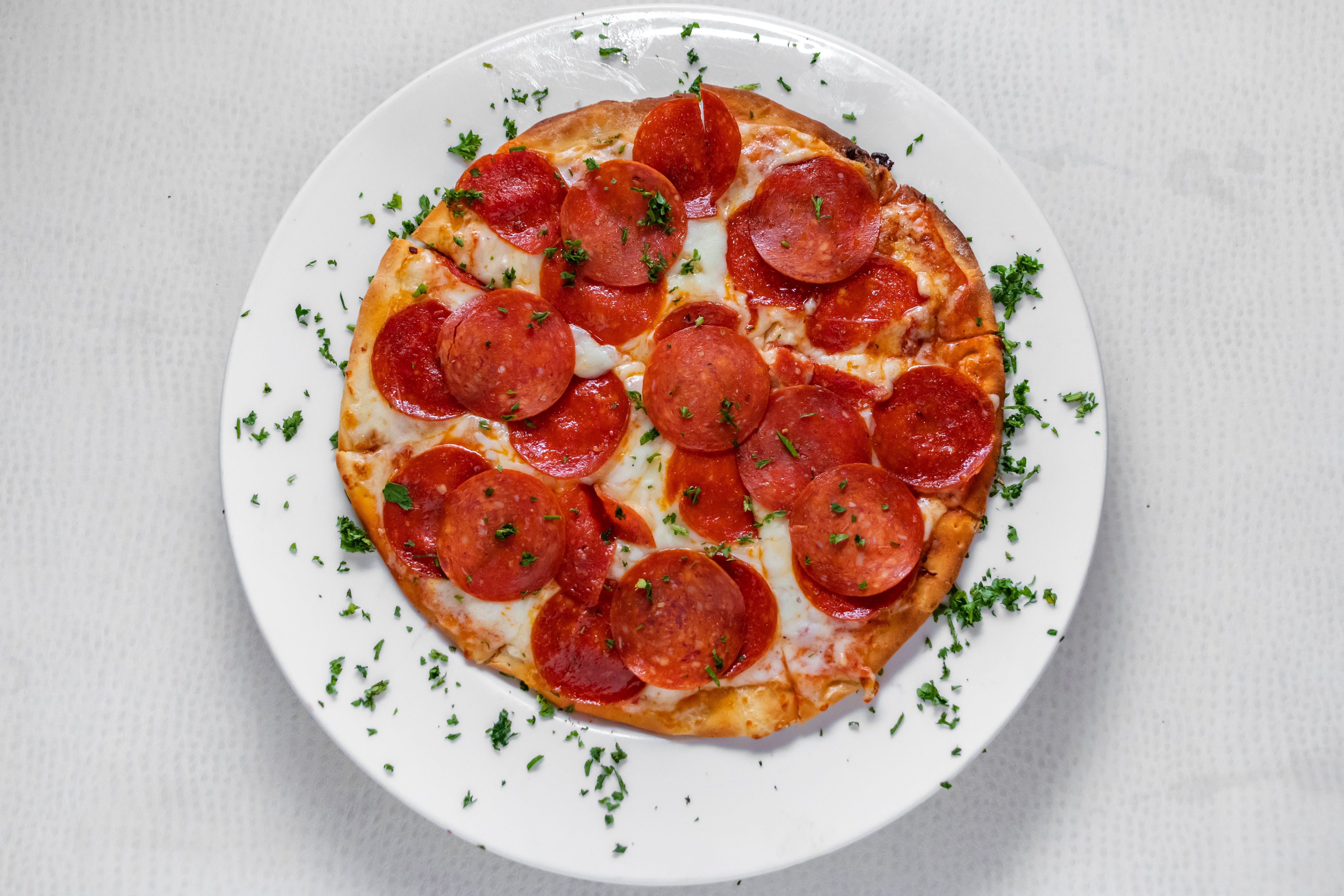 Order Pepperoni Pizza - 10'' (8 Slices) food online from Prima Pasta Restaurant store, Houston on bringmethat.com