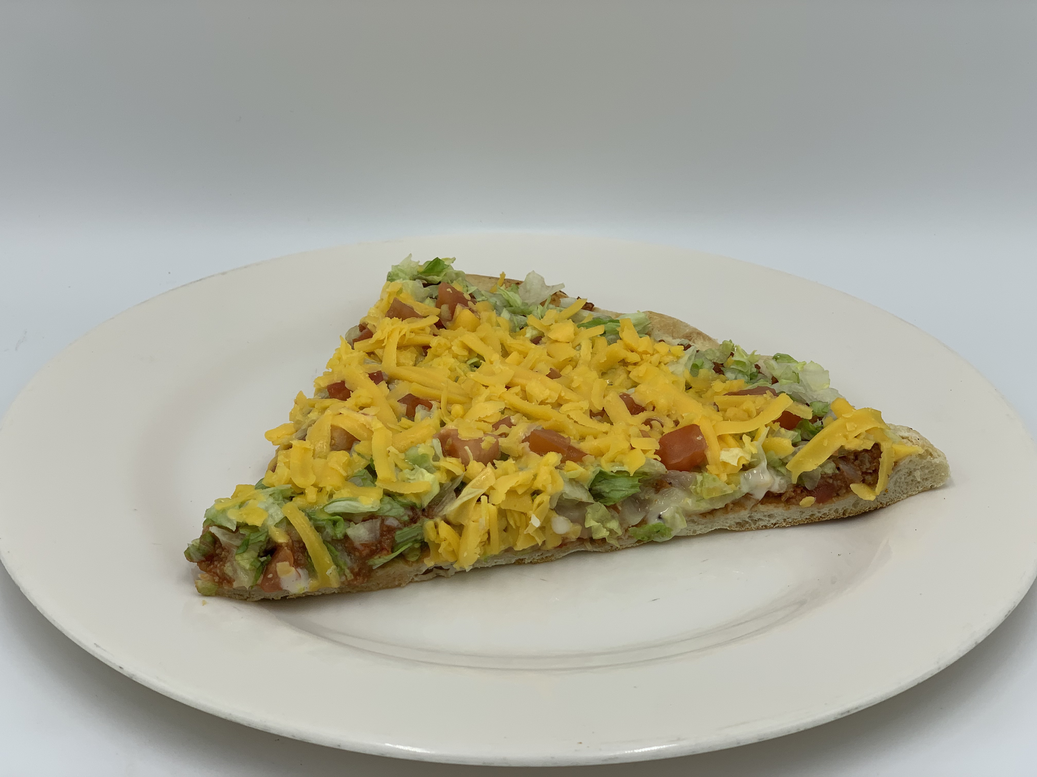 Order Taco Pizza food online from Mario's Pizzeria of Seaford store, Seaford on bringmethat.com