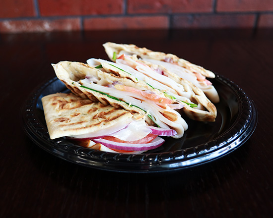 Order Chipotle Turkey Panini food online from Frullati Cafe & Bakery store, Canton on bringmethat.com