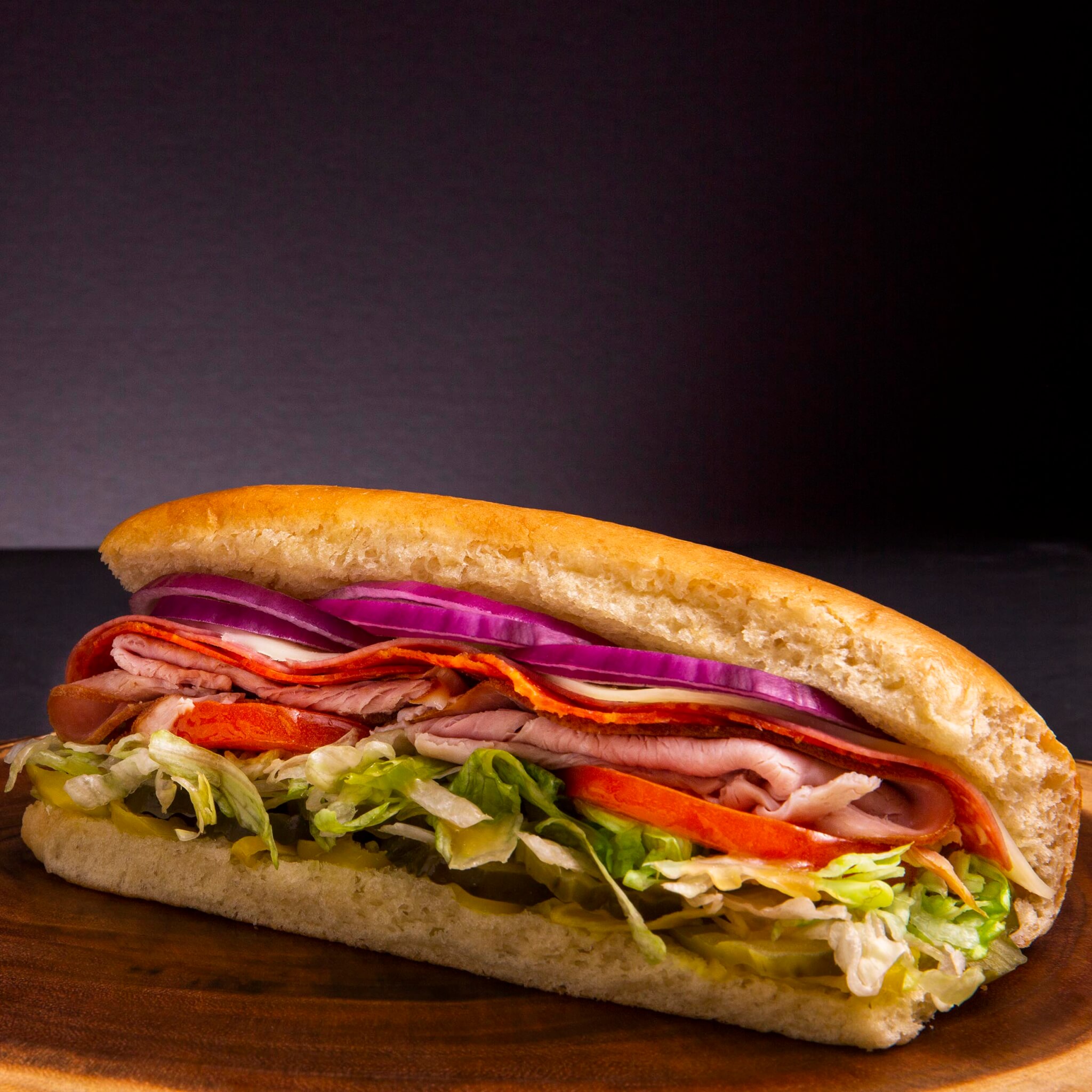 Order Italian Sub food online from Cafe Deli-Cious store, New York on bringmethat.com