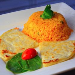Order 4. Kids 1 Quesadilla and Rice food online from Don Ramon Mexican Grill store, Cleveland on bringmethat.com