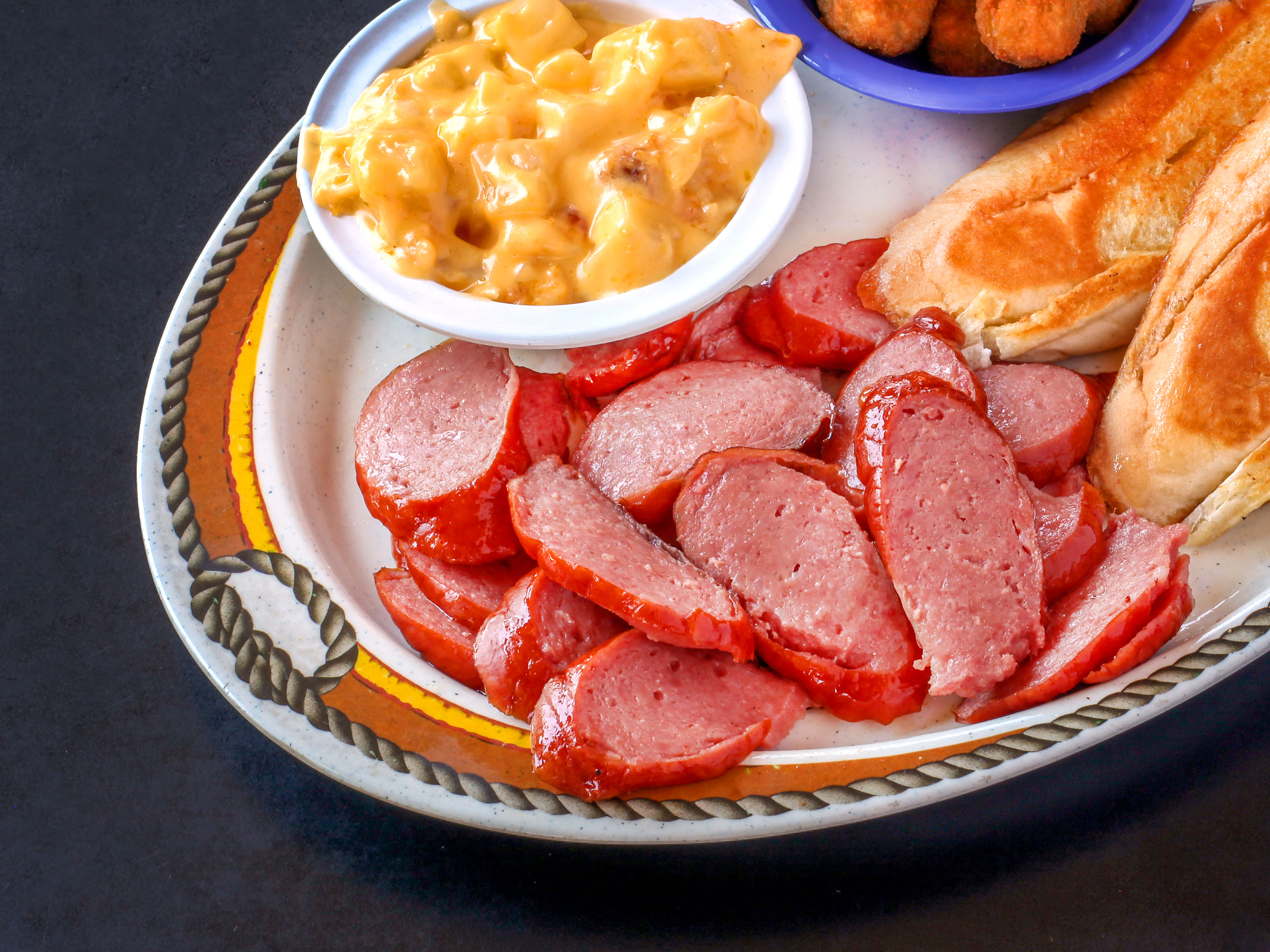 Order 8 oz. Sausage Plate food online from Smoking Barrels BBQ store, St Louis on bringmethat.com