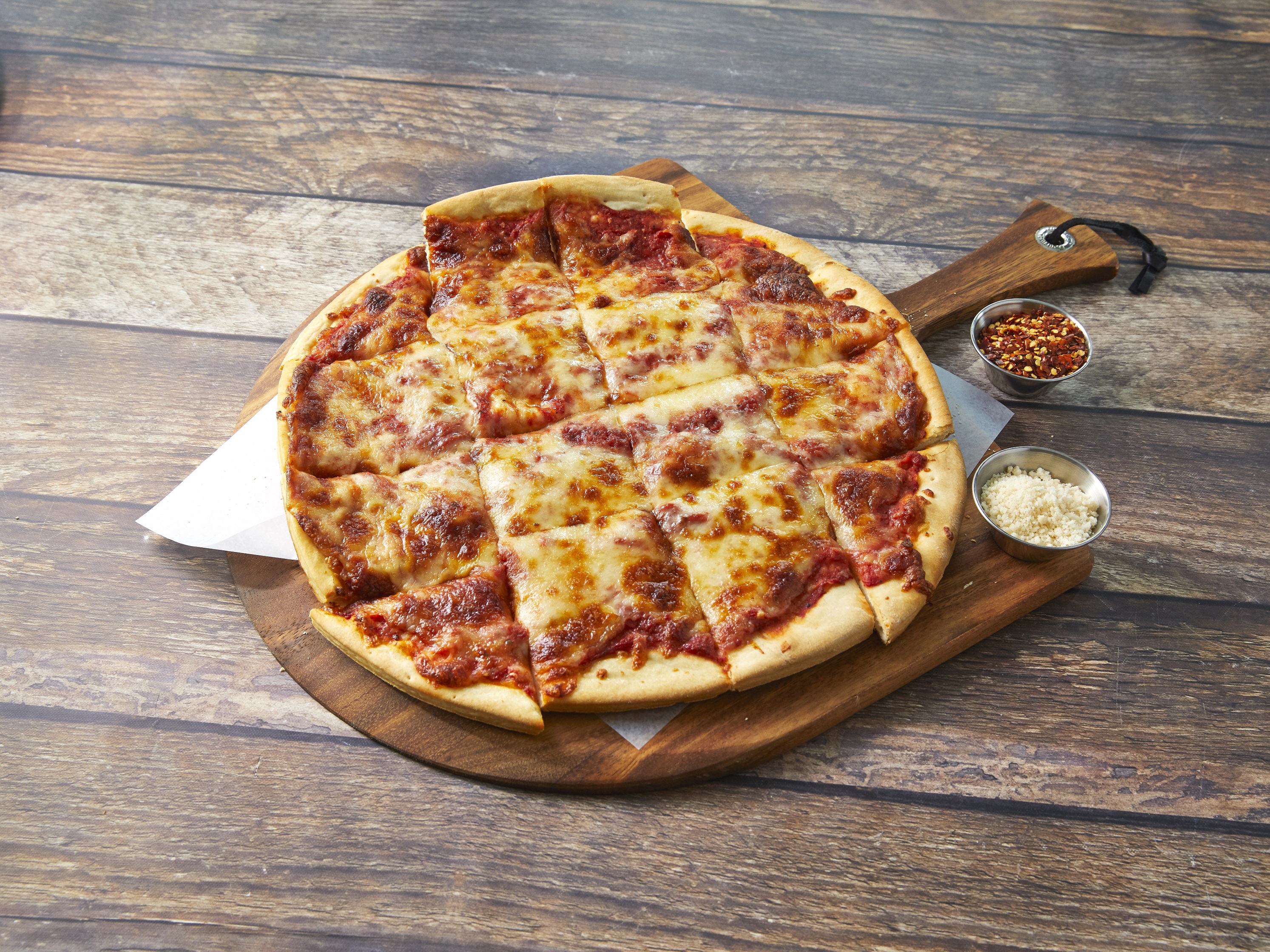 Order Thin Crust Cheese Pizza food online from Dinicos Pizza store, Chicago on bringmethat.com