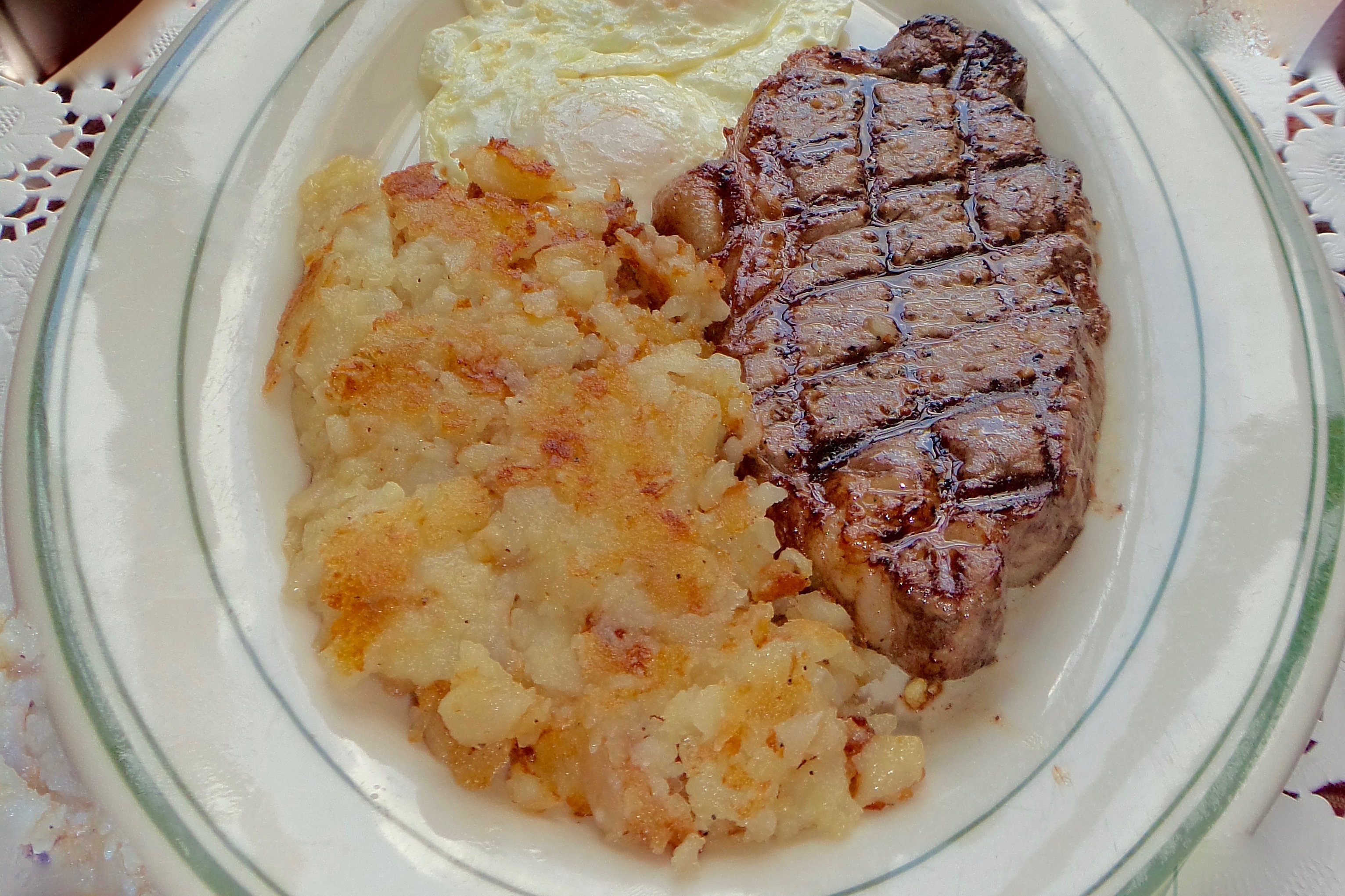 Order Angus Ny Strip Steak (10 Oz.) ＆ Eggs food online from Sandy Springs Diner store, Atlanta on bringmethat.com