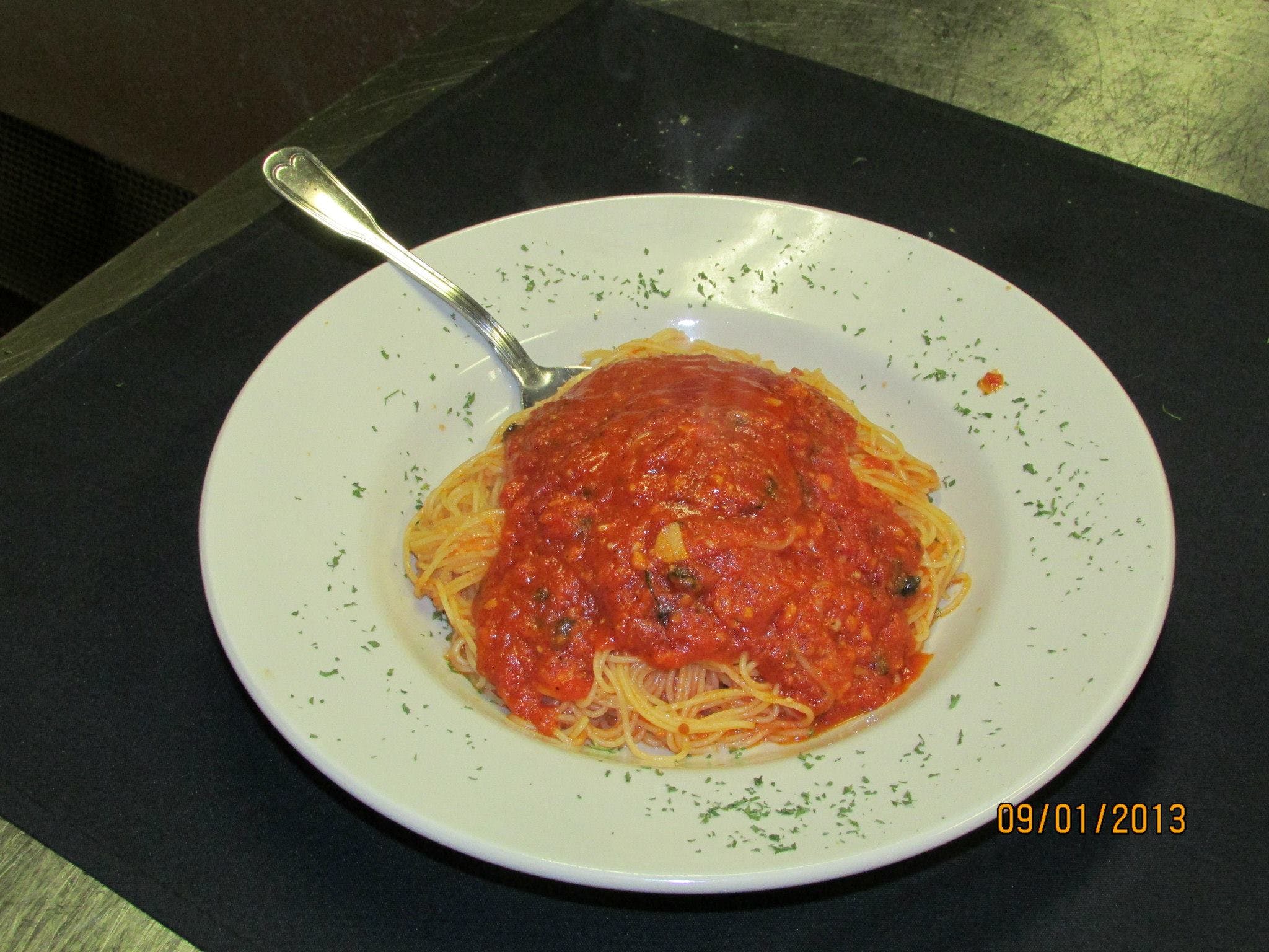 Order Capellini Pomodori - Pasta food online from Macaluso's Italian Restaurant store, Fort Worth on bringmethat.com