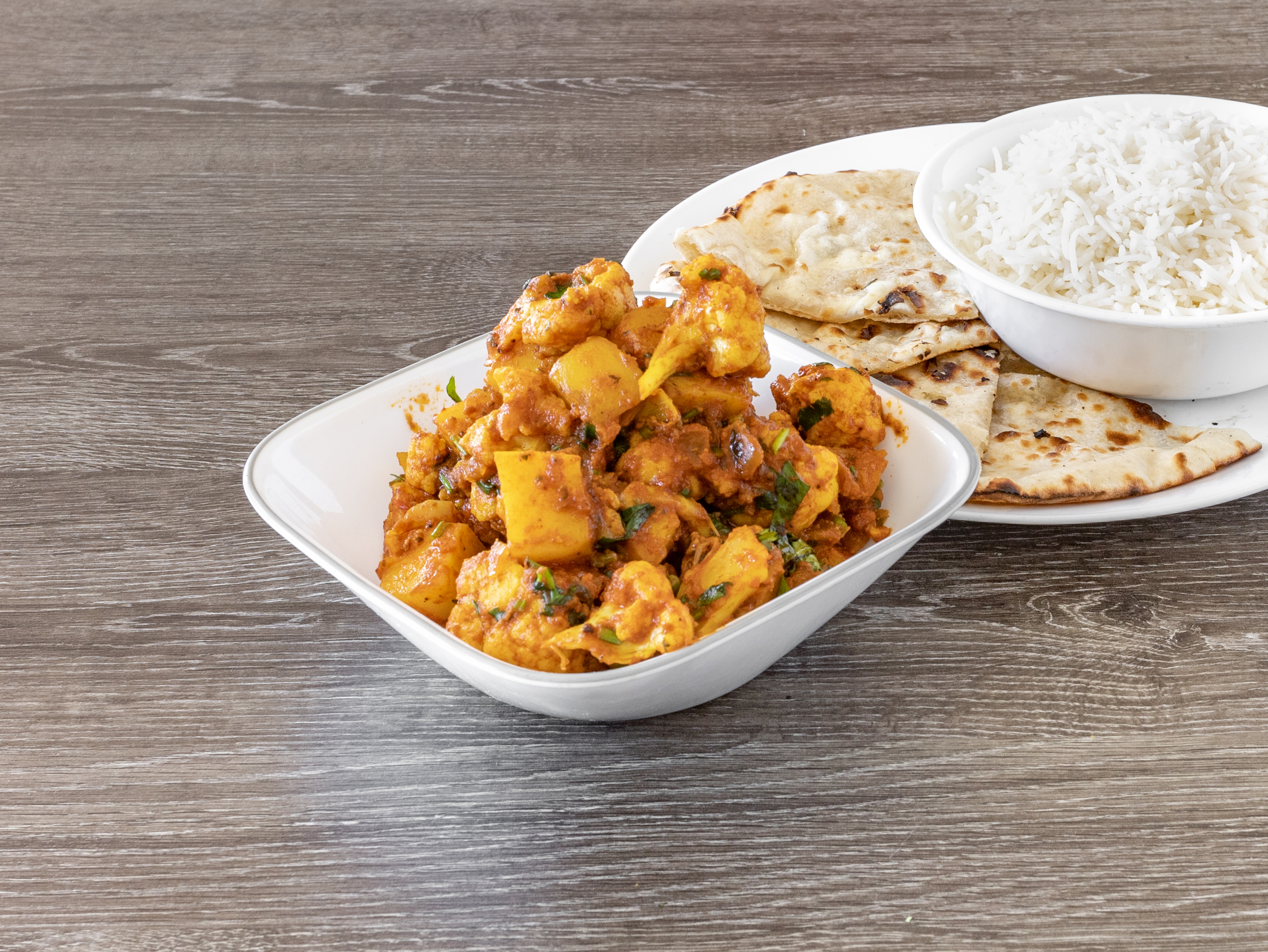 Order Aloo Gobi Masala (2 Servings) food online from Fresh Curry Chefs store, Camarillo on bringmethat.com