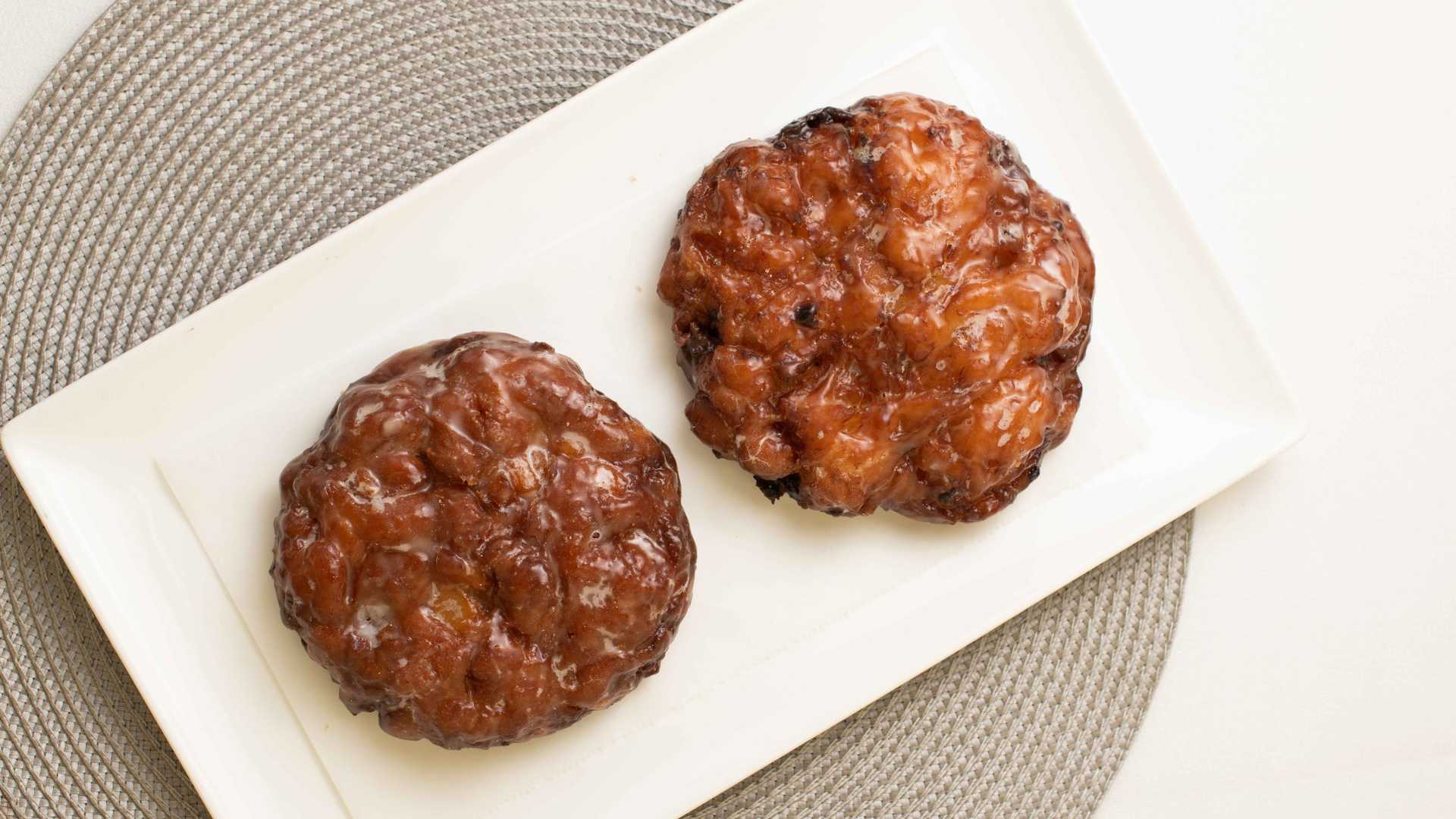 Order Apple Fritters 1/2 Dozen food online from country donutz store, Salisbury on bringmethat.com