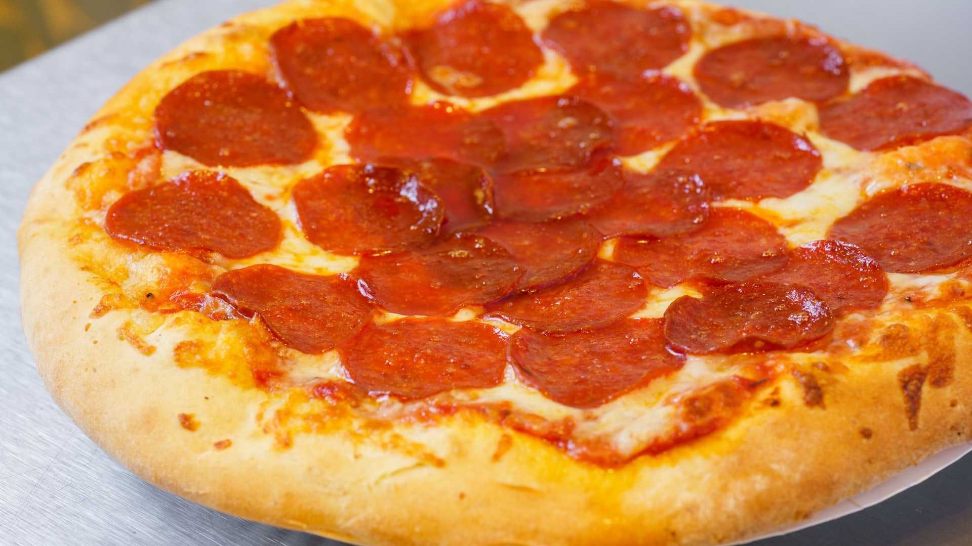 Order Pepperoni Pizza - Small 10'' food online from Abe's Pizza store, San Francisco on bringmethat.com