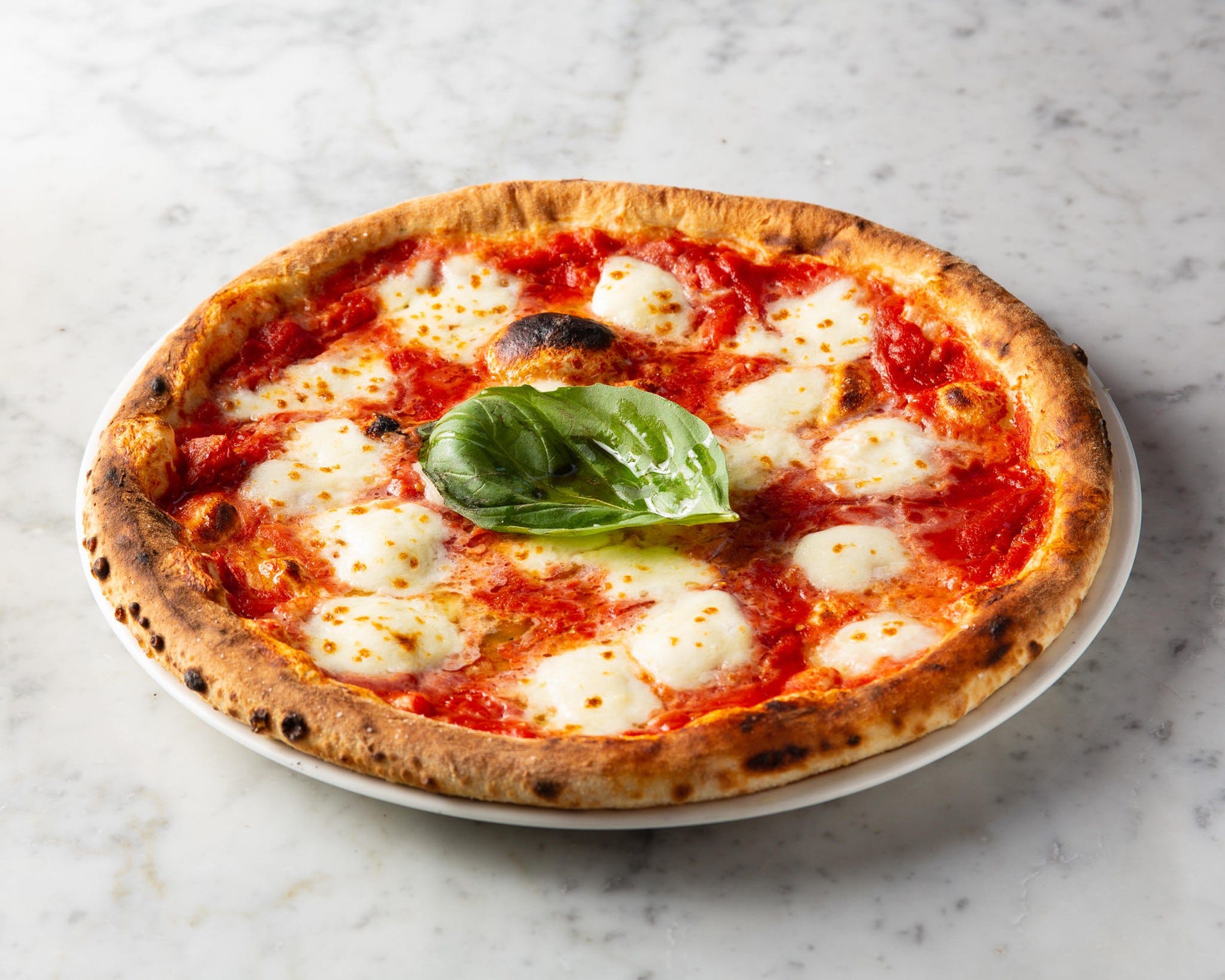 Order Margherita Mozzarella di Bufala Pizza - Pizza food online from Cafe Quattro store, Boston on bringmethat.com