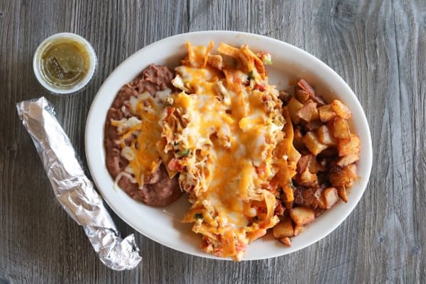 Order Chilaquiles - Beef food online from Fuzzy Taco Shop store, Abilene on bringmethat.com