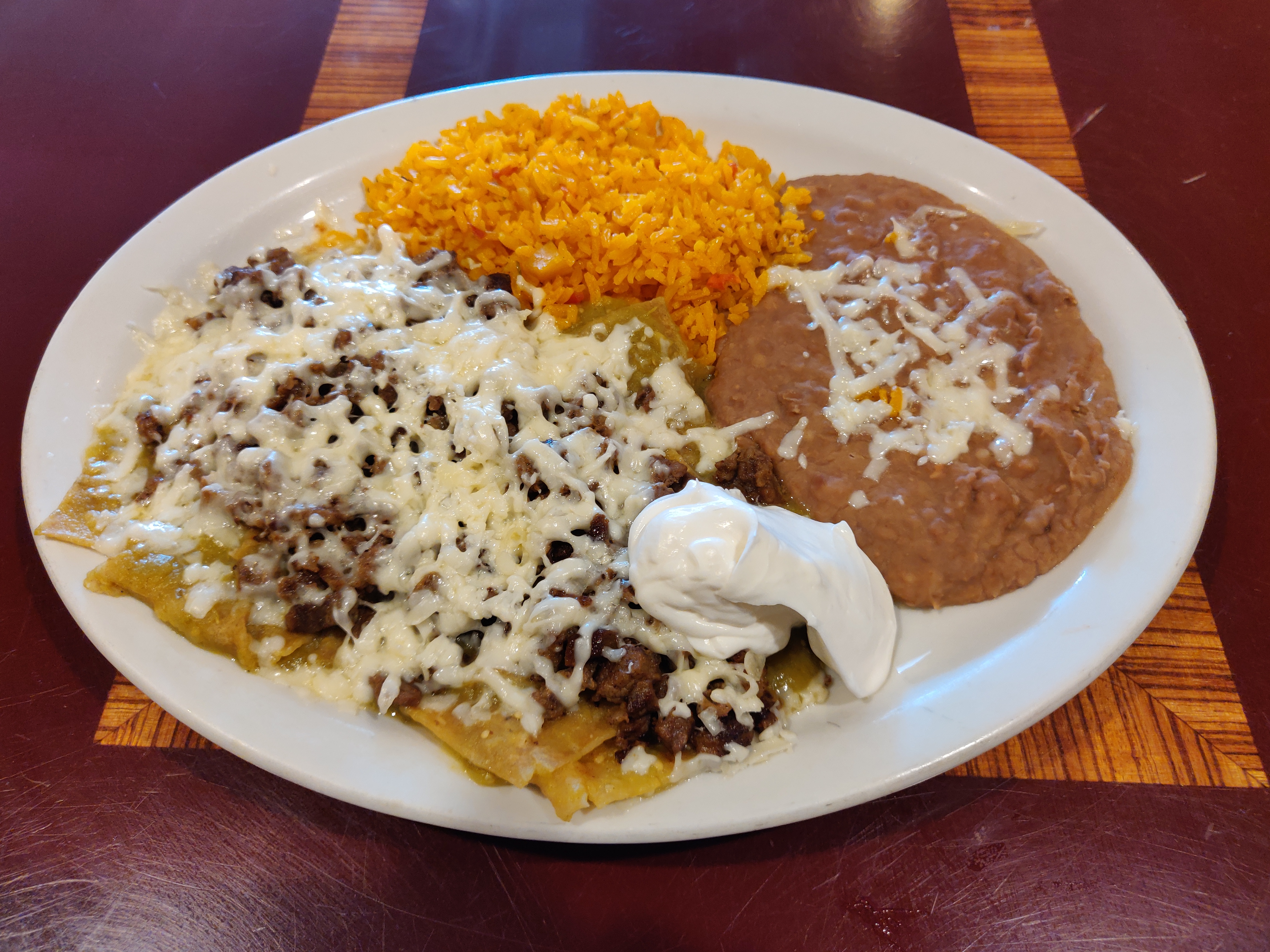 Order Chilaquiles con Carne Steak Breakfast food online from El Ranchito store, Chicago on bringmethat.com
