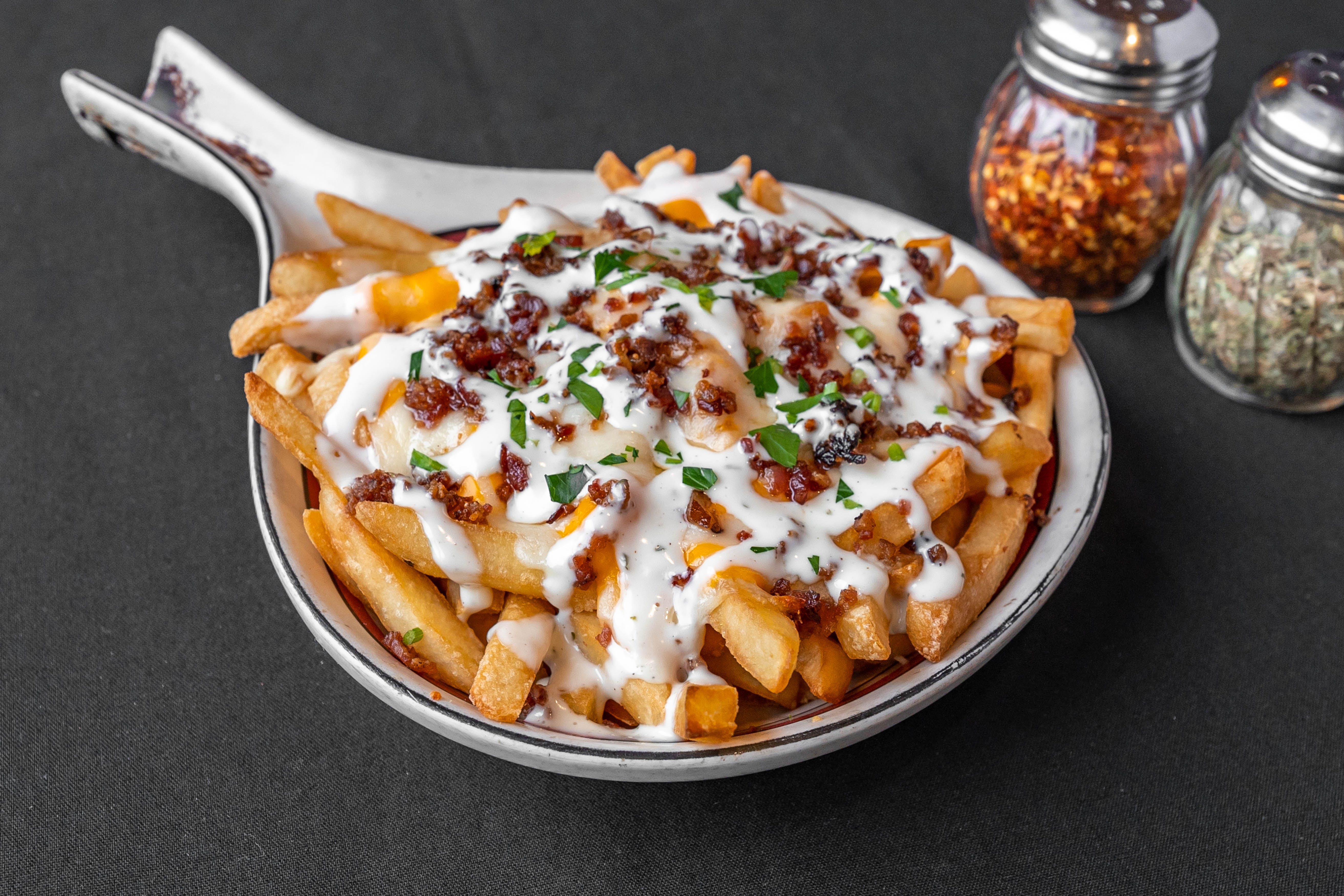 Order Loaded Fries - Appetizer food online from Nicos Pizza store, New Britain on bringmethat.com