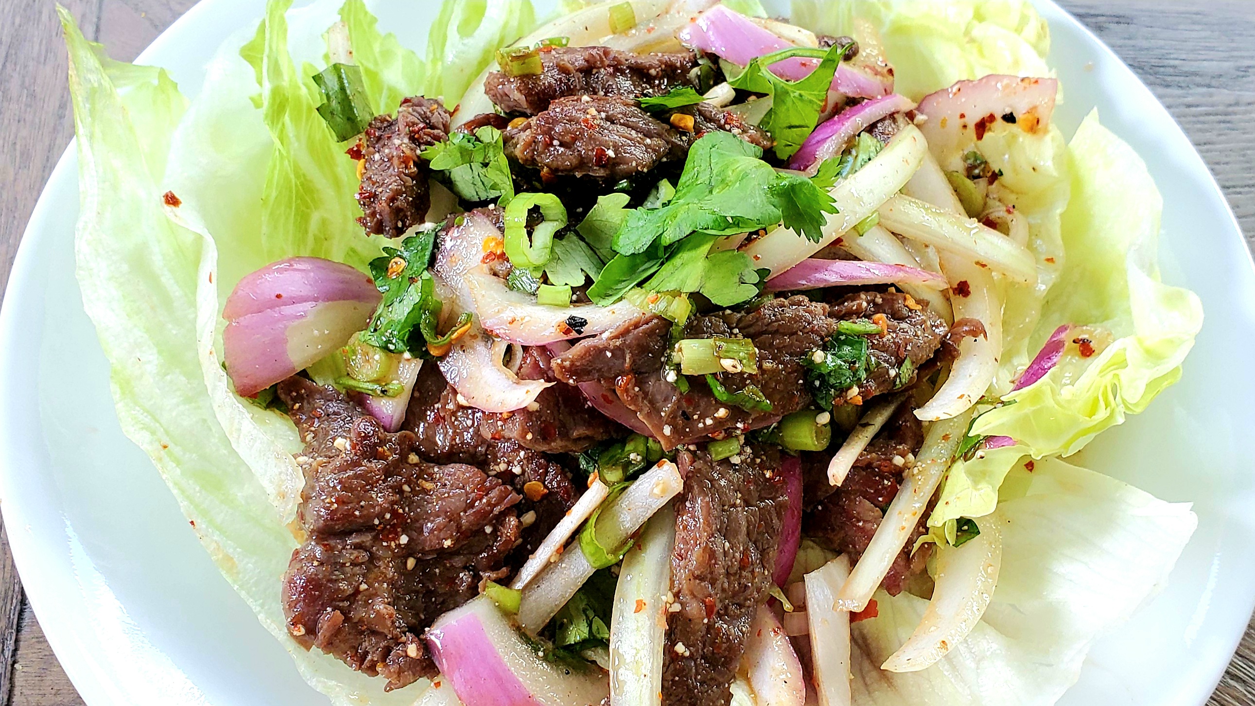 Order Nam Tok (Grilled Beef Salad) with Sticky Rice food online from Thai Paradise store, Severna Park on bringmethat.com