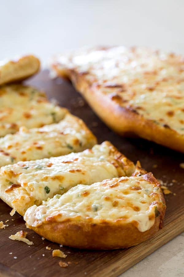 Order 1/2 Loaf Cheesy Garlic Bread food online from Pizza Show store, Hawthorne on bringmethat.com