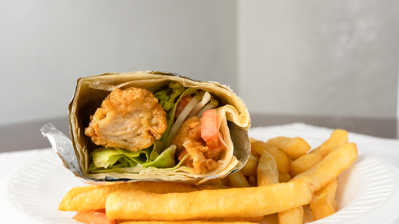 Order Grilled Chicken Wrap food online from Coolahan Pub & Grill store, Halethorpe on bringmethat.com