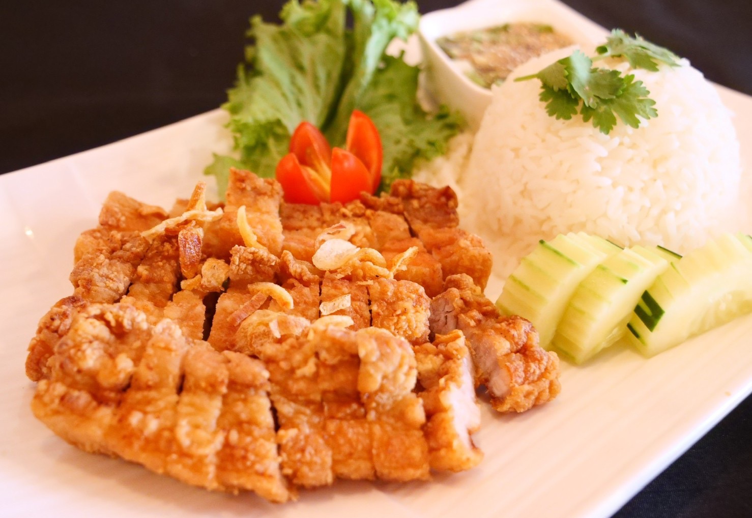 Order Khao Moo Tod (Crispy pork over rice) food online from Lan Larb store, New York on bringmethat.com