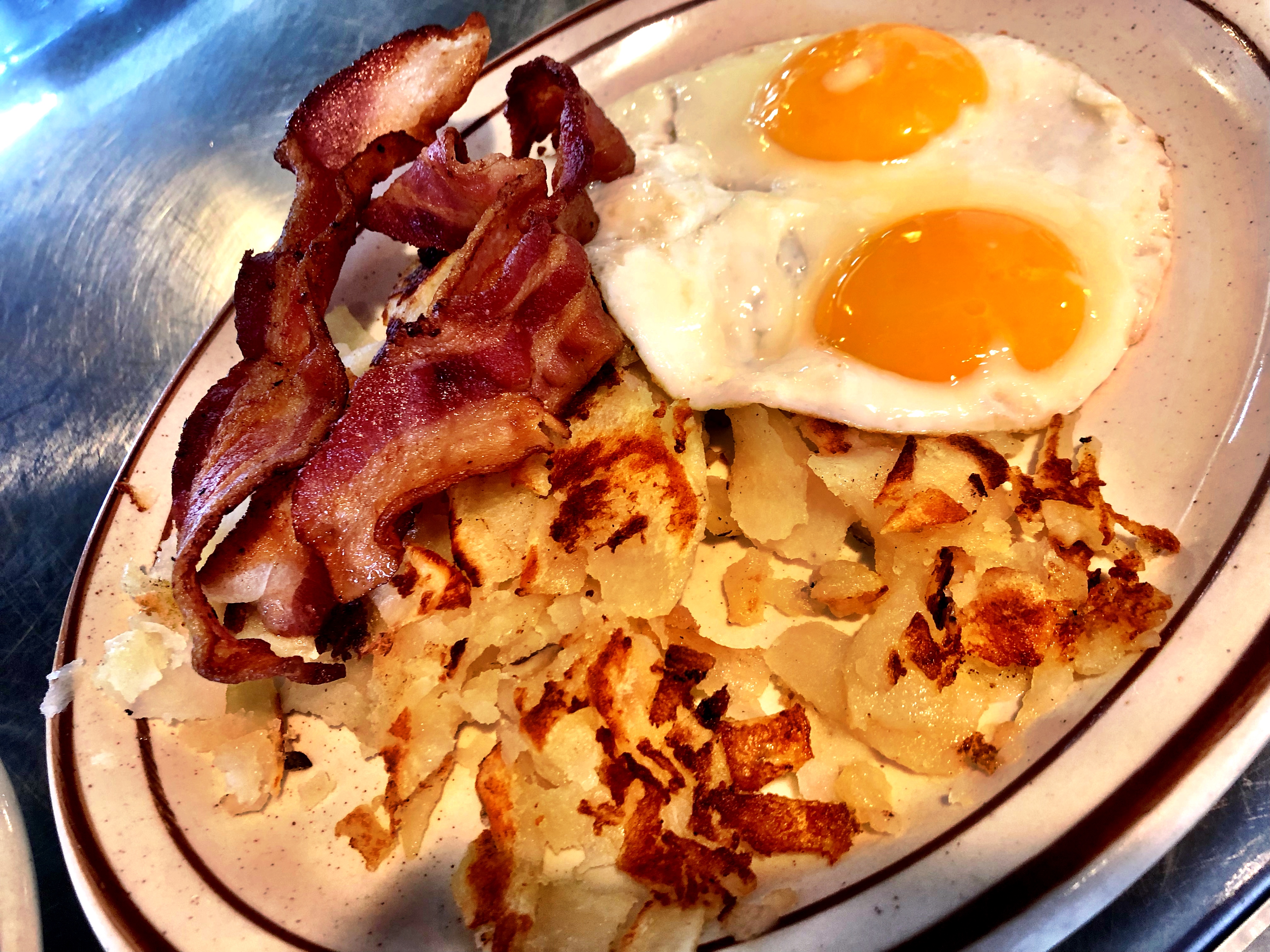 Order 2 Eggs & 3 Strips of Bacon food online from Eat'n Park store, Burbank on bringmethat.com