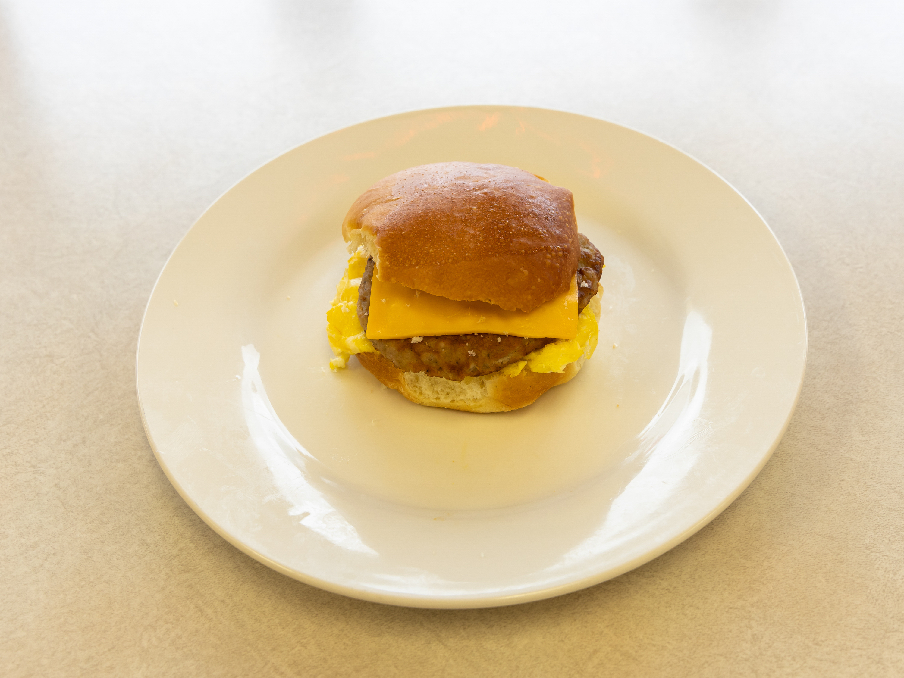 Order Sausage Egg and Cheese Biscuit food online from Mr. Donut And Kolache store, Jersey Village on bringmethat.com