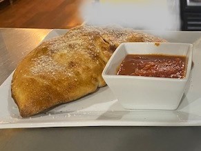 Order Spinach Calzone food online from The Brick Oven store, Charlottesville on bringmethat.com