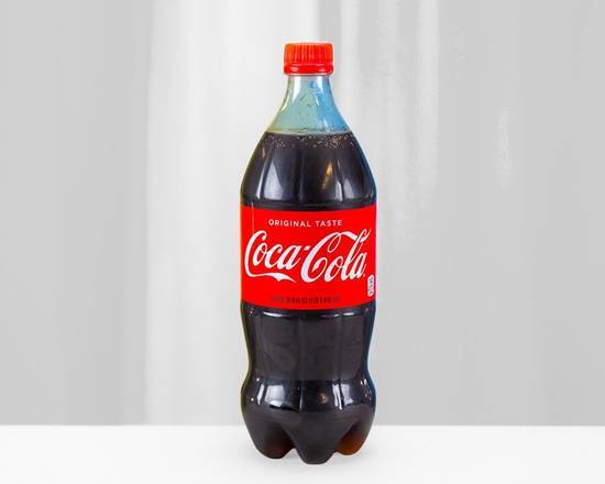Order Coca Cola - 1 liter food online from Munchie Magic store, Snoqualmie on bringmethat.com